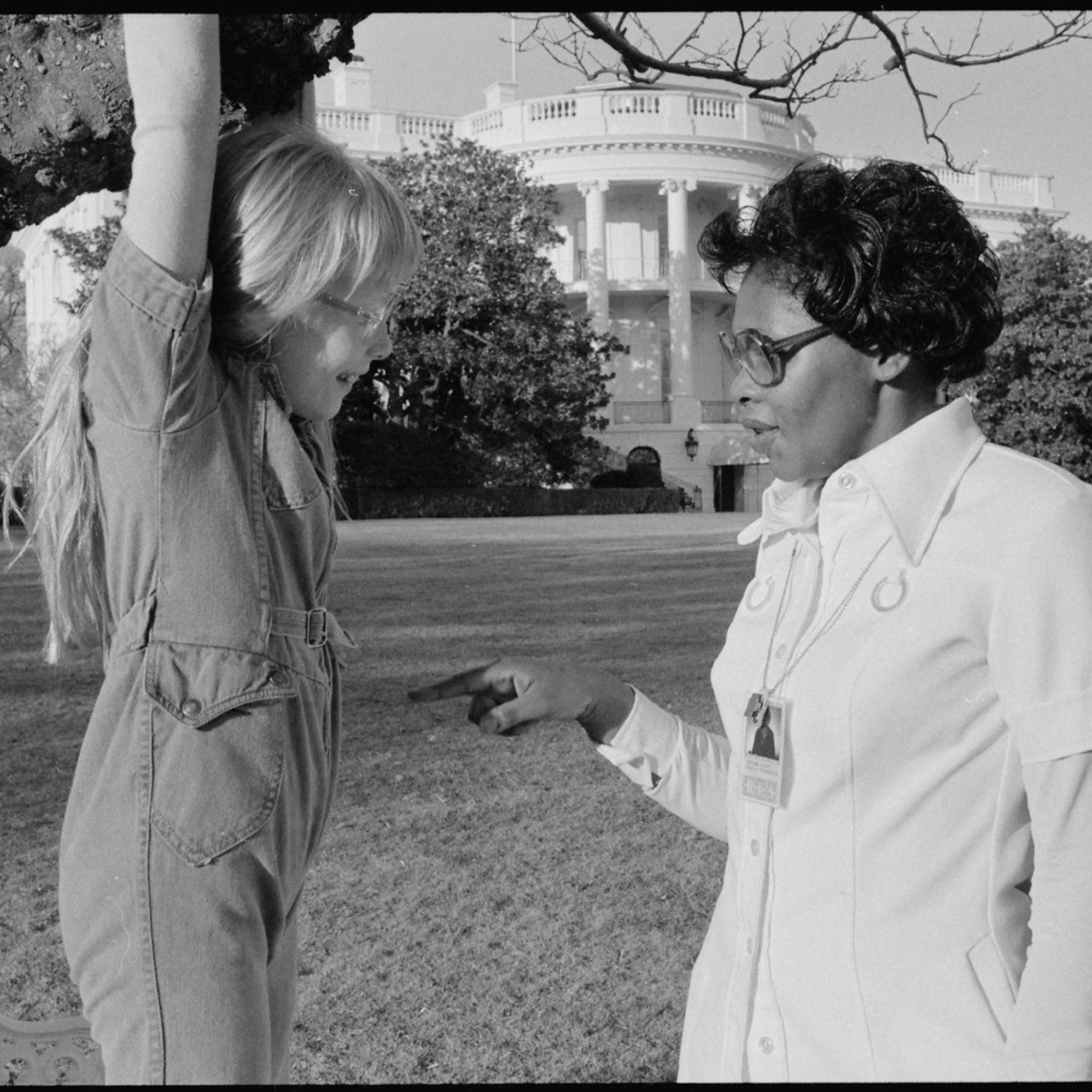 Amy Carter playing on the White House grounds with Mary Prince