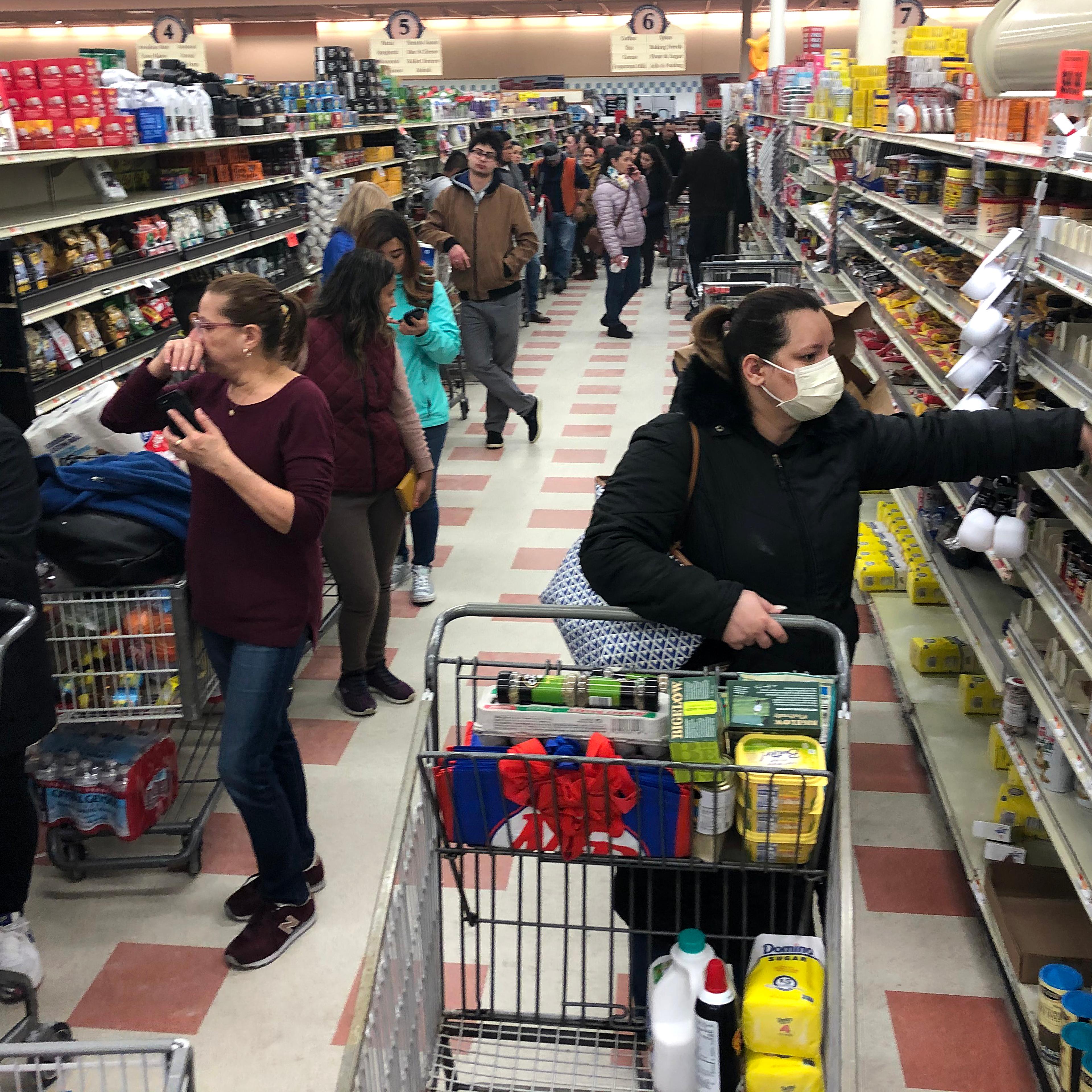 Shoppers Stock Up As Coronavirus Cases Grow