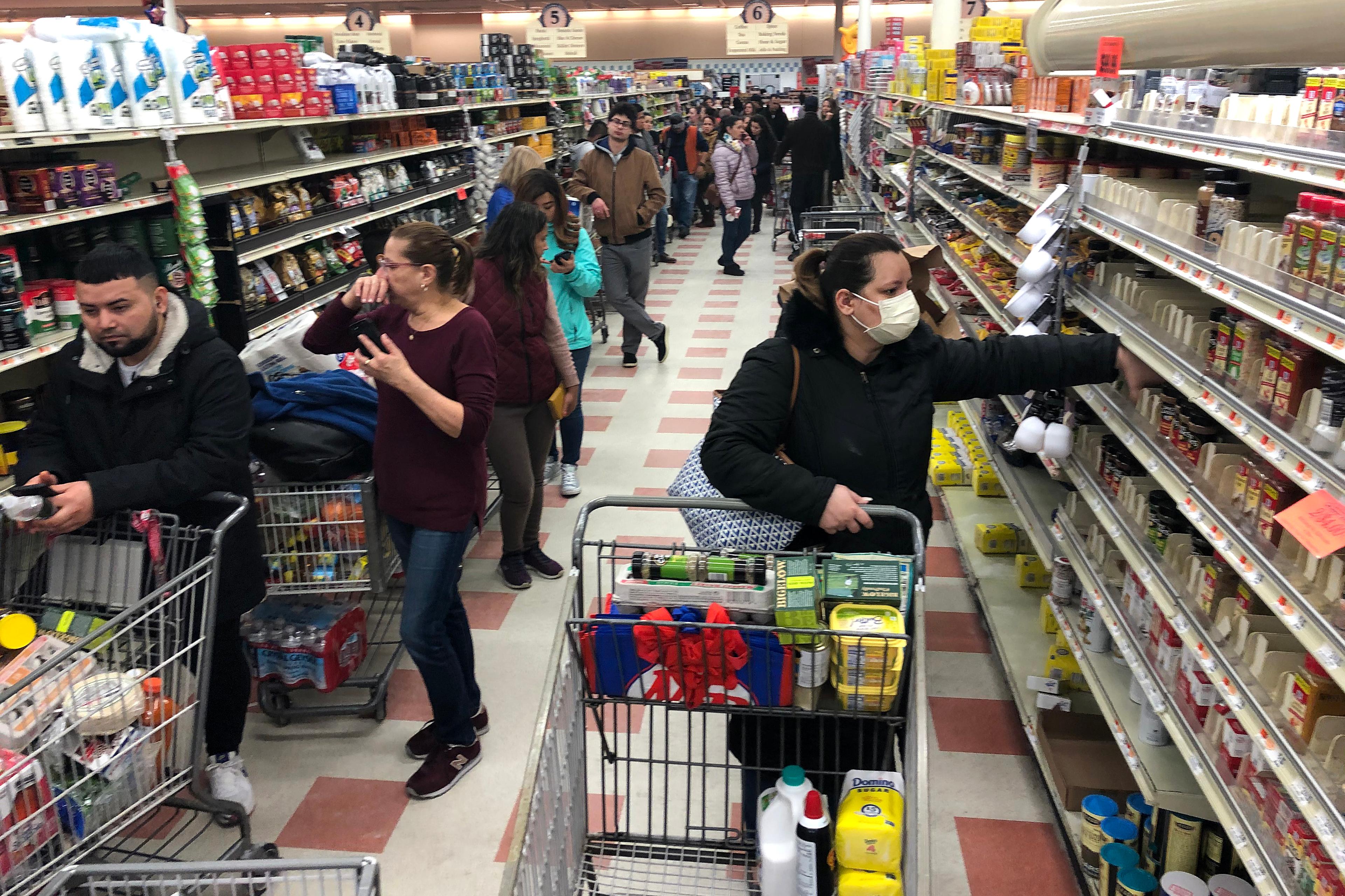 Shoppers Stock Up As Coronavirus Cases Grow