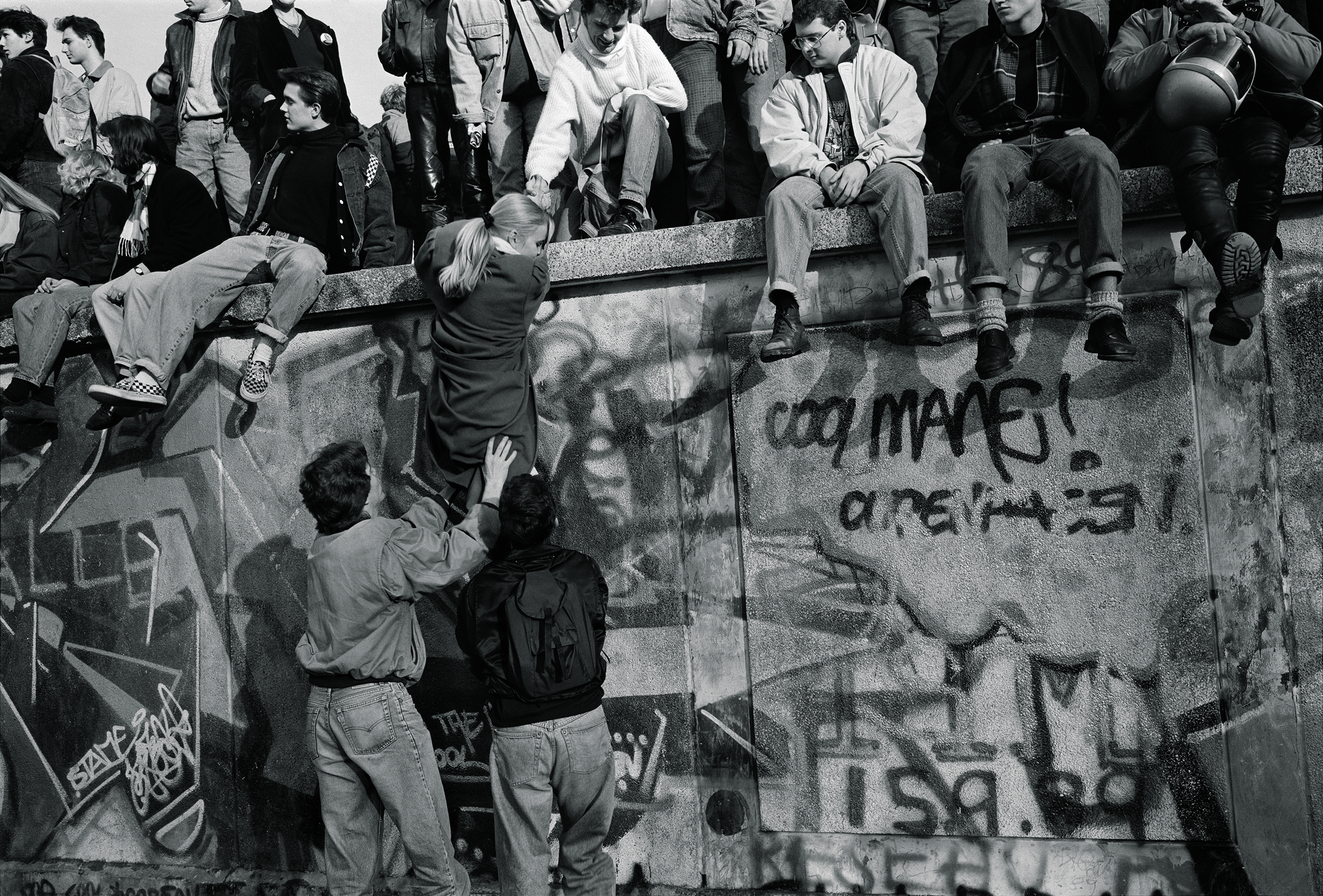 Crowds atop the Berlin Wall on the morning after it fell, Nov. 10, 1989.