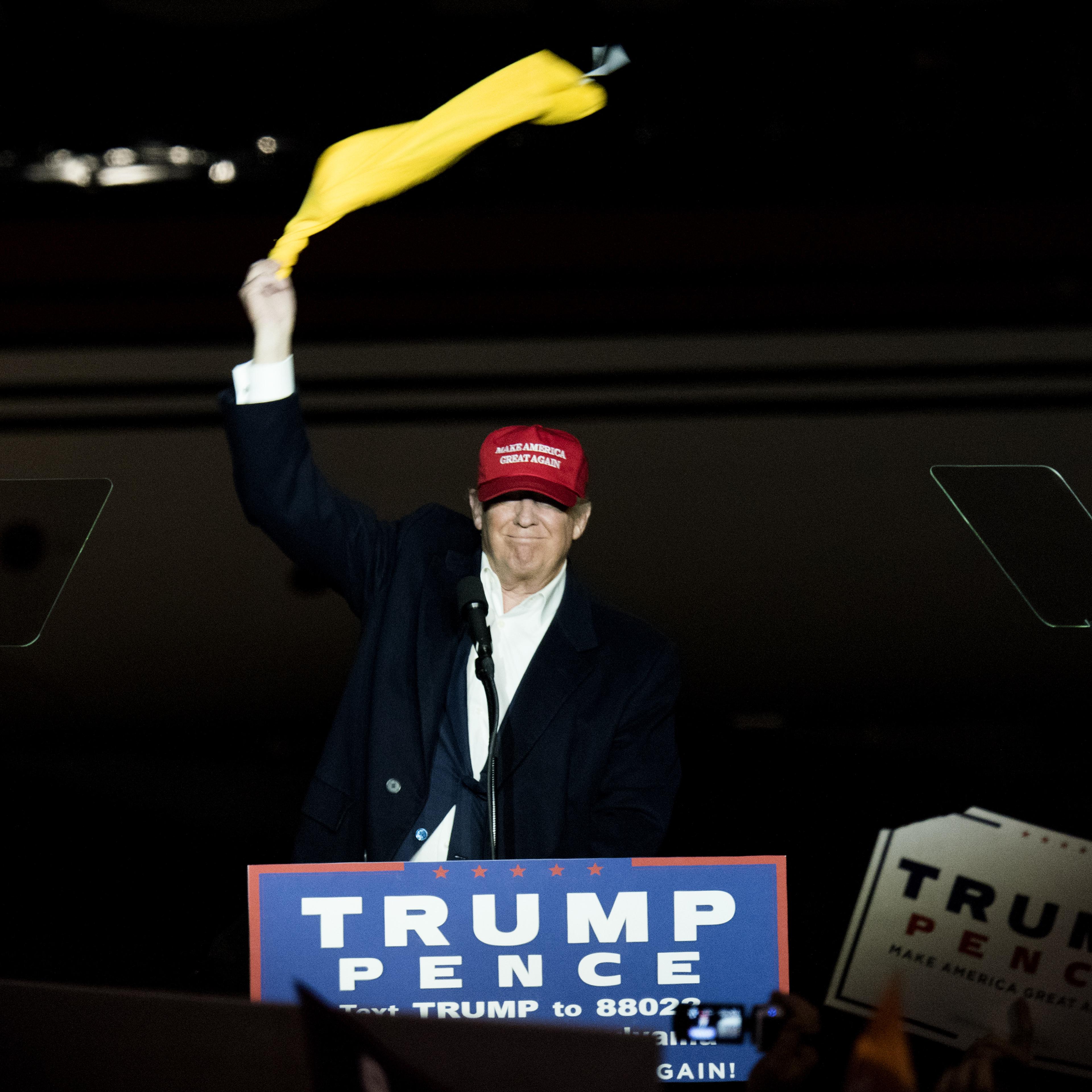 Donald Trump, 2016 Republican presidential nominee, gestures as he speaks during a campaign rally in Moon Township, Penn., on Nov. 6, 2016.
