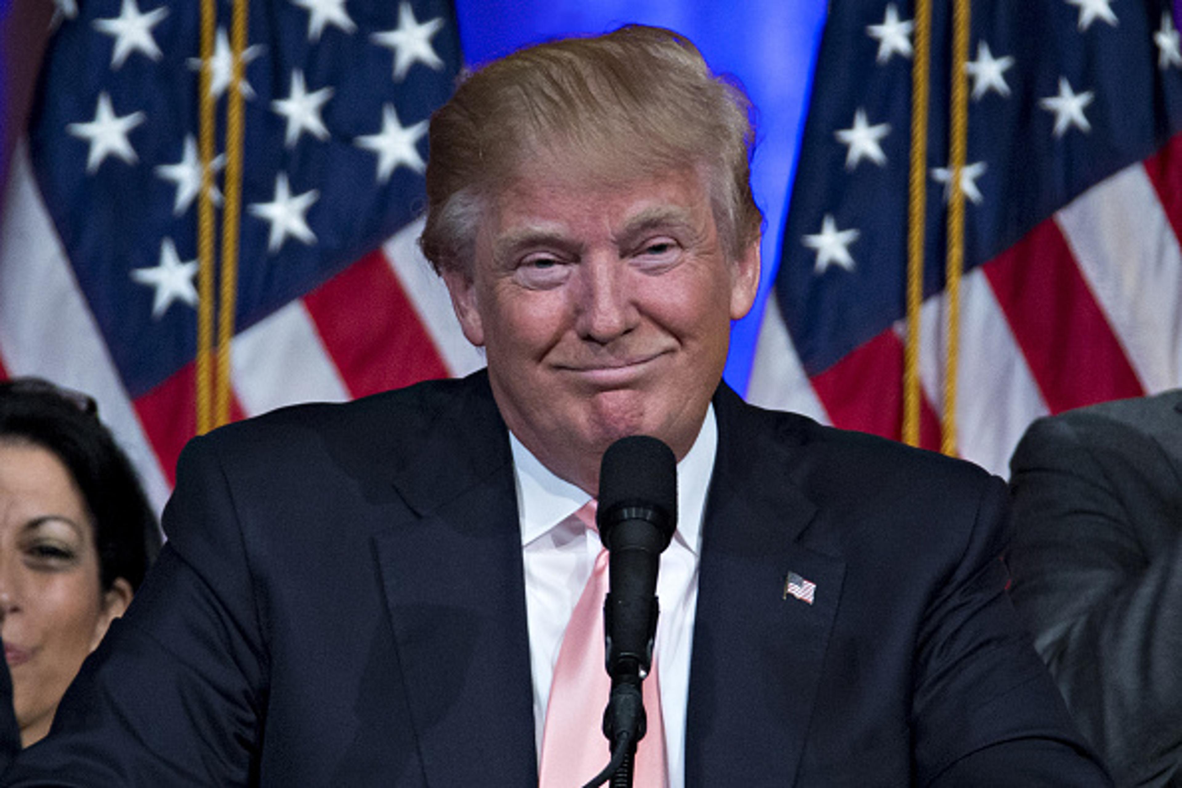 Donald Trump, president and chief executive of Trump Organization Inc. and 2016 Republican presidential candidate, smiles while speaking during a news conference at the Mar-A-Lago Club in Palm Beach, Fla., on March 15, 2016.