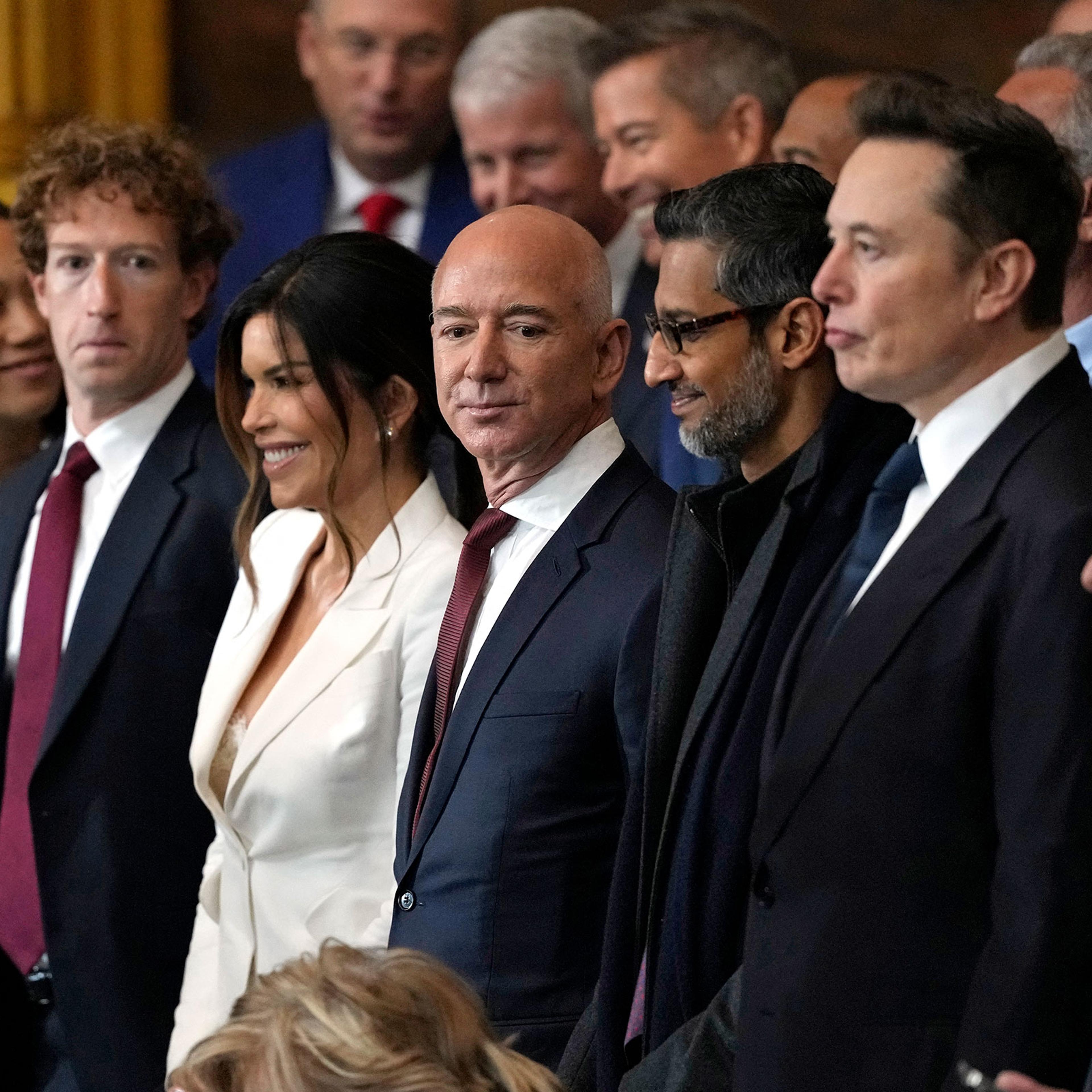 (L-R) CEO of Meta Mark Zuckerberg, Lauren Sanchez, US businessman Jeff Bezos, CEO of Alphabet Inc and Google Sundar Pichai and Teska and SpaceX CEO Elon Musk attend the inauguration ceremony where Donald Trump will sworn in as the 47th US President in the US Capitol Rotunda in Washington, DC, on Jan. 20, 2025.