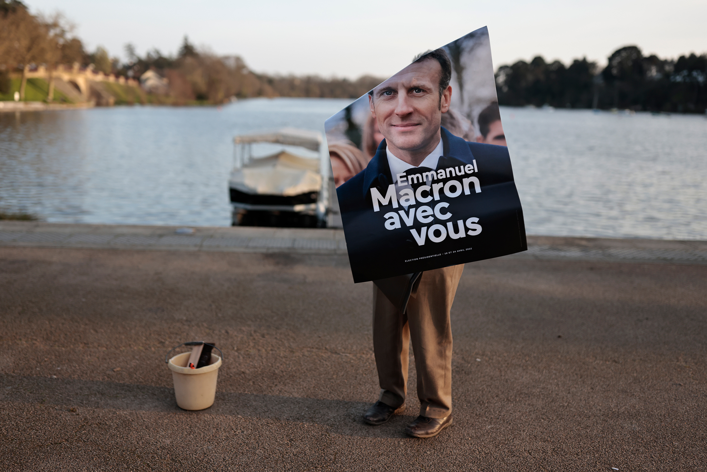 A campaign poster showing President Macron on March 22