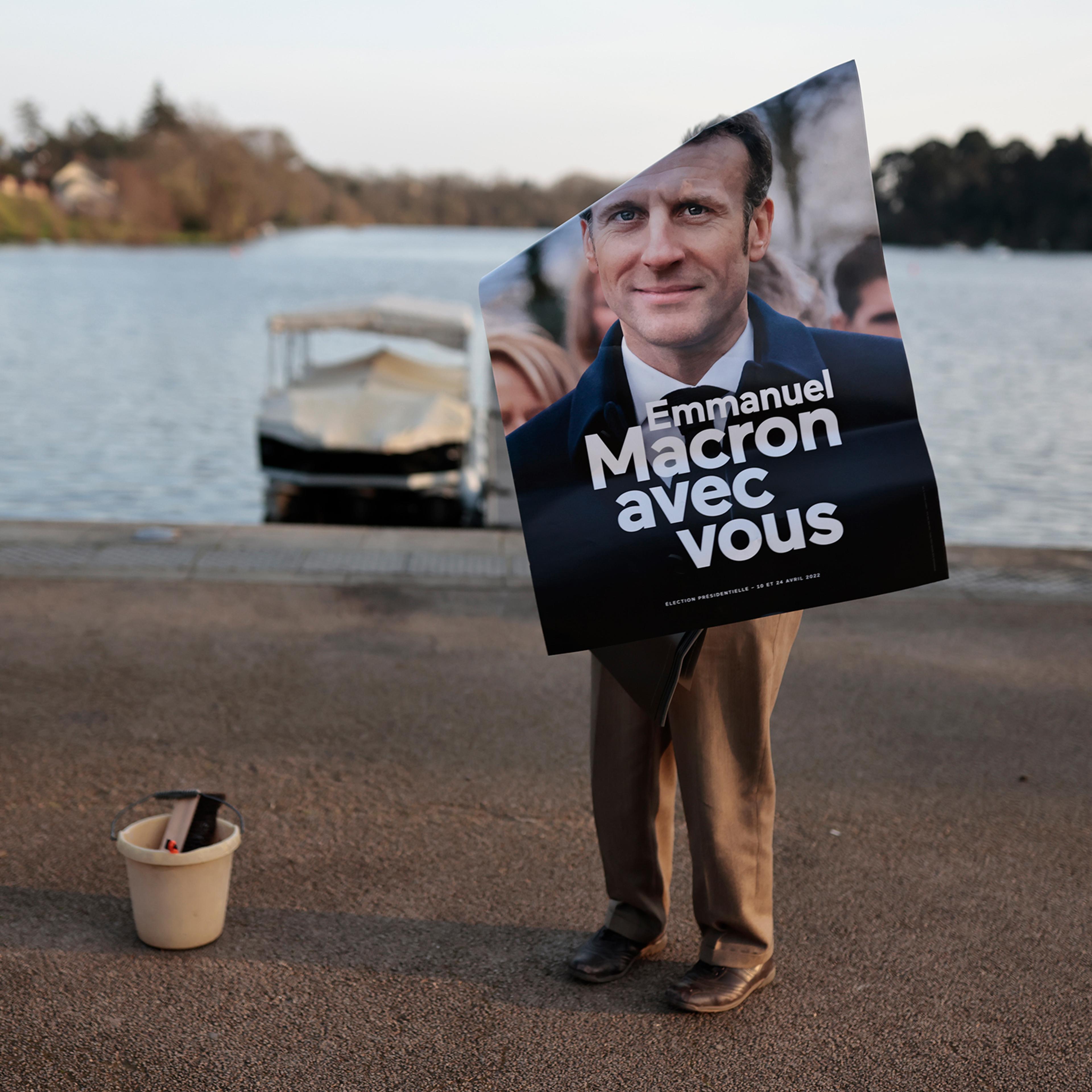A campaign poster showing President Macron on March 22