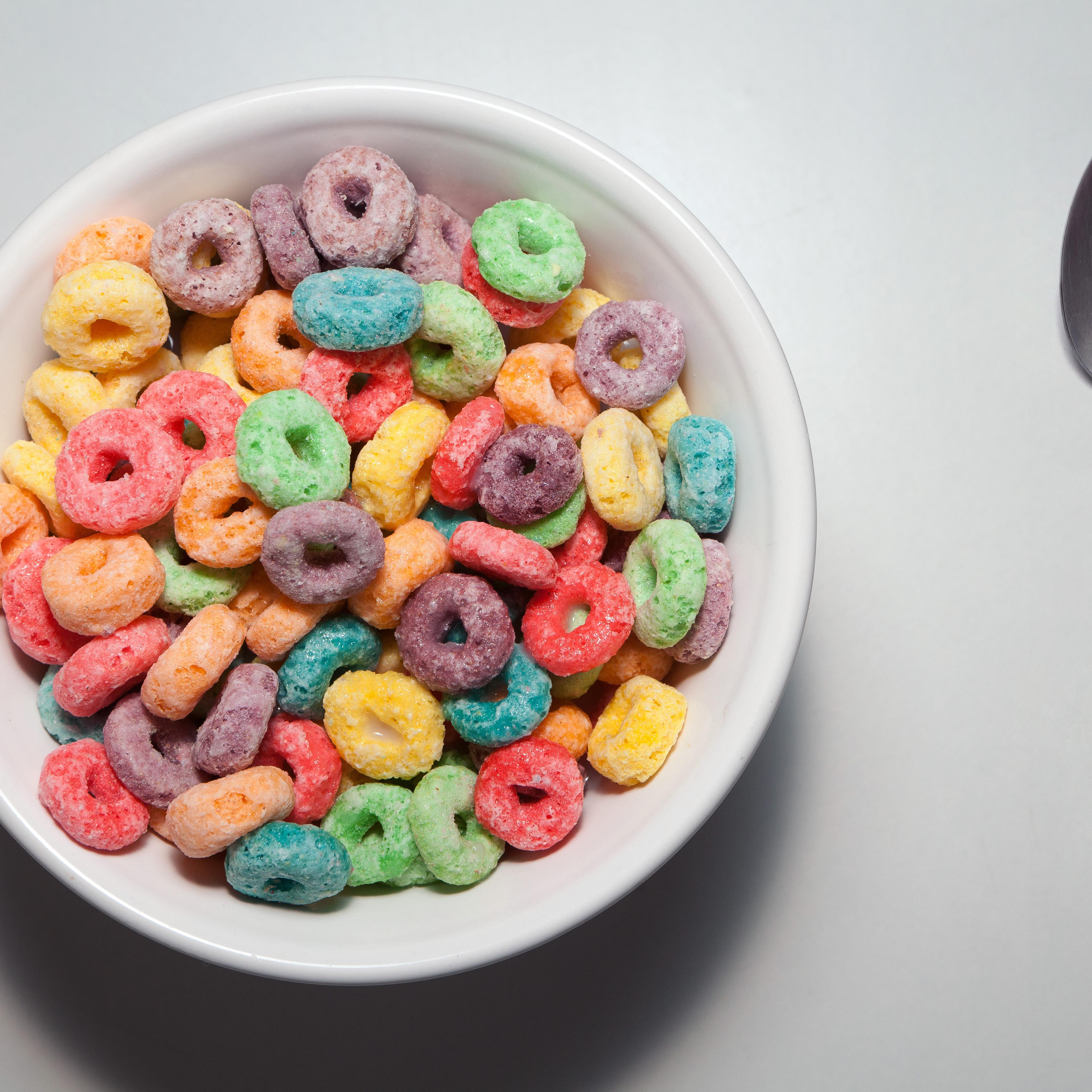 Bowl of colorful breakfast cereal with spoon