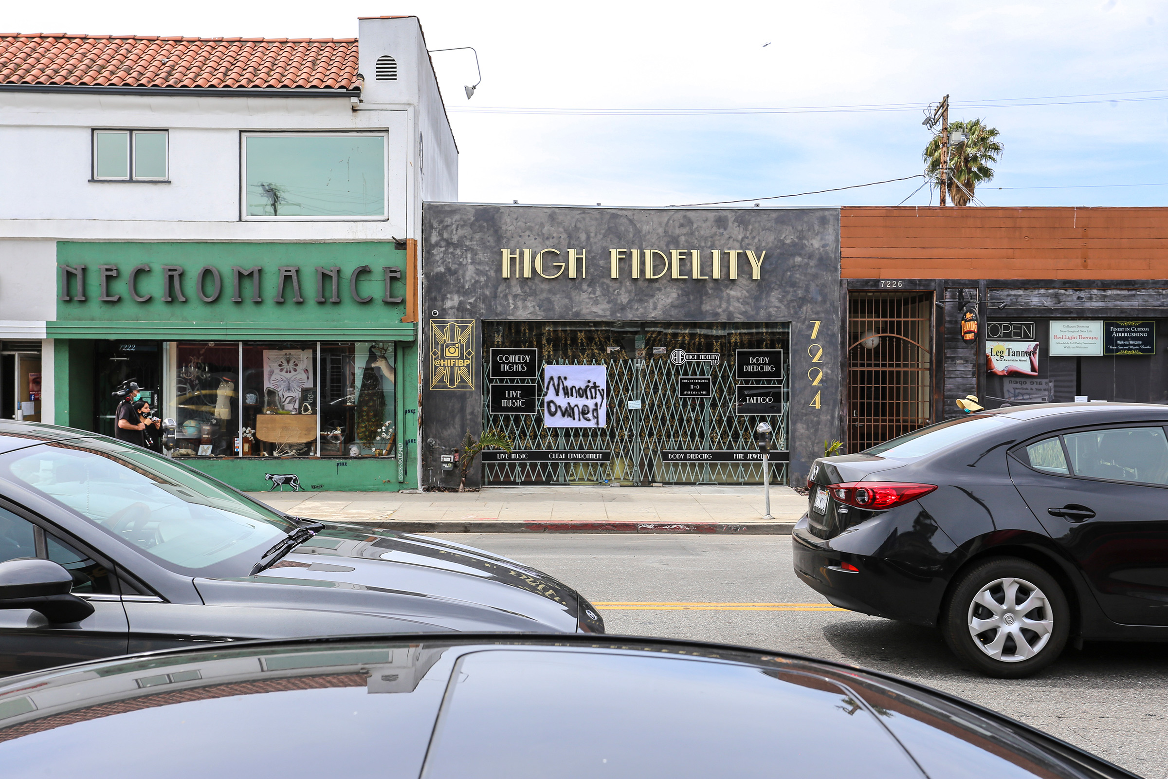High Fidelity, a black owned business on Melrose Avenue, Los Angeles, displays a "Minority Owned" sign on May 31