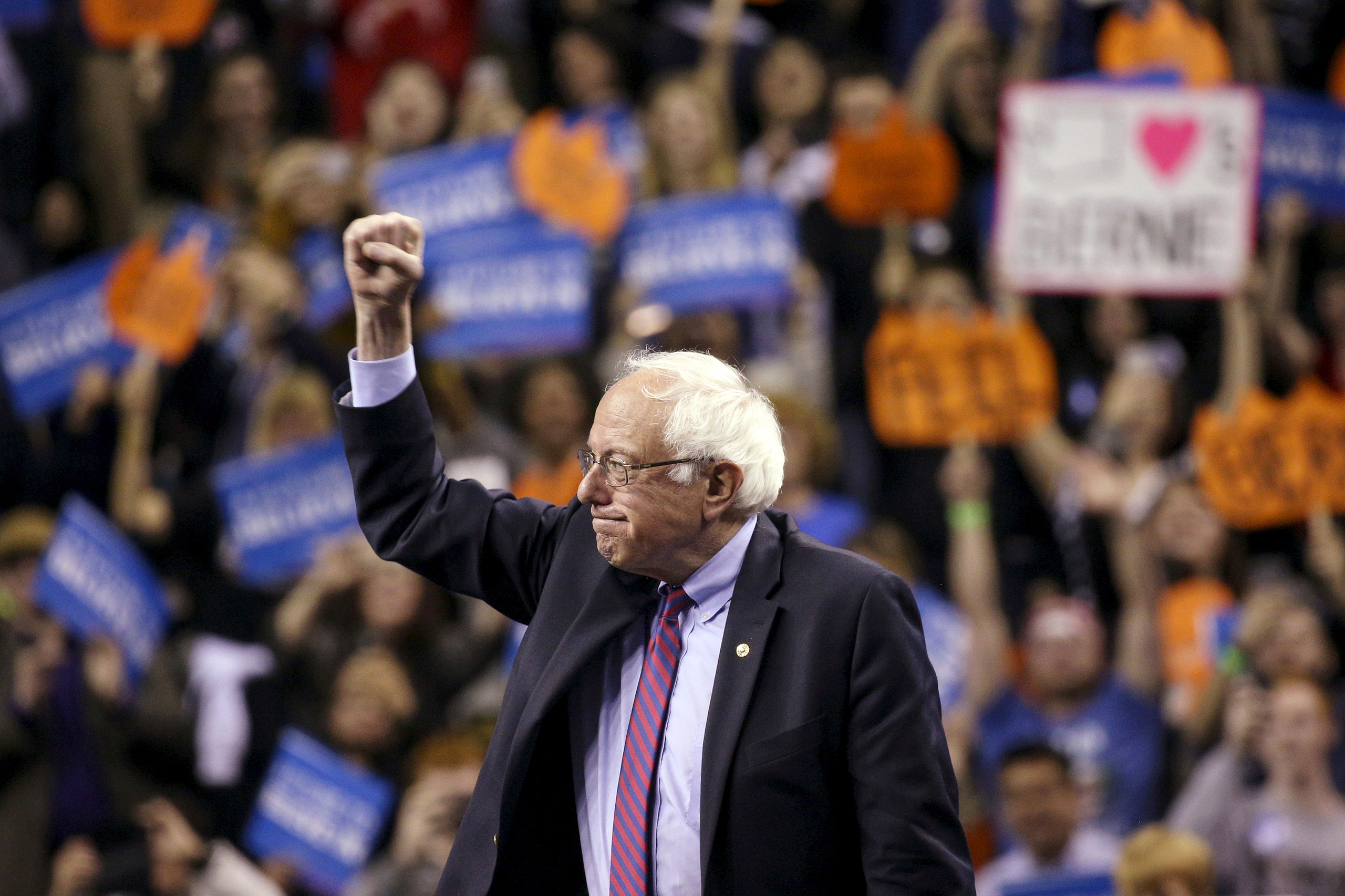 Bernie Sanders greets his supporters as he arrives at a rally at Key Arena in Seattle, Washington, March 20, 2016.