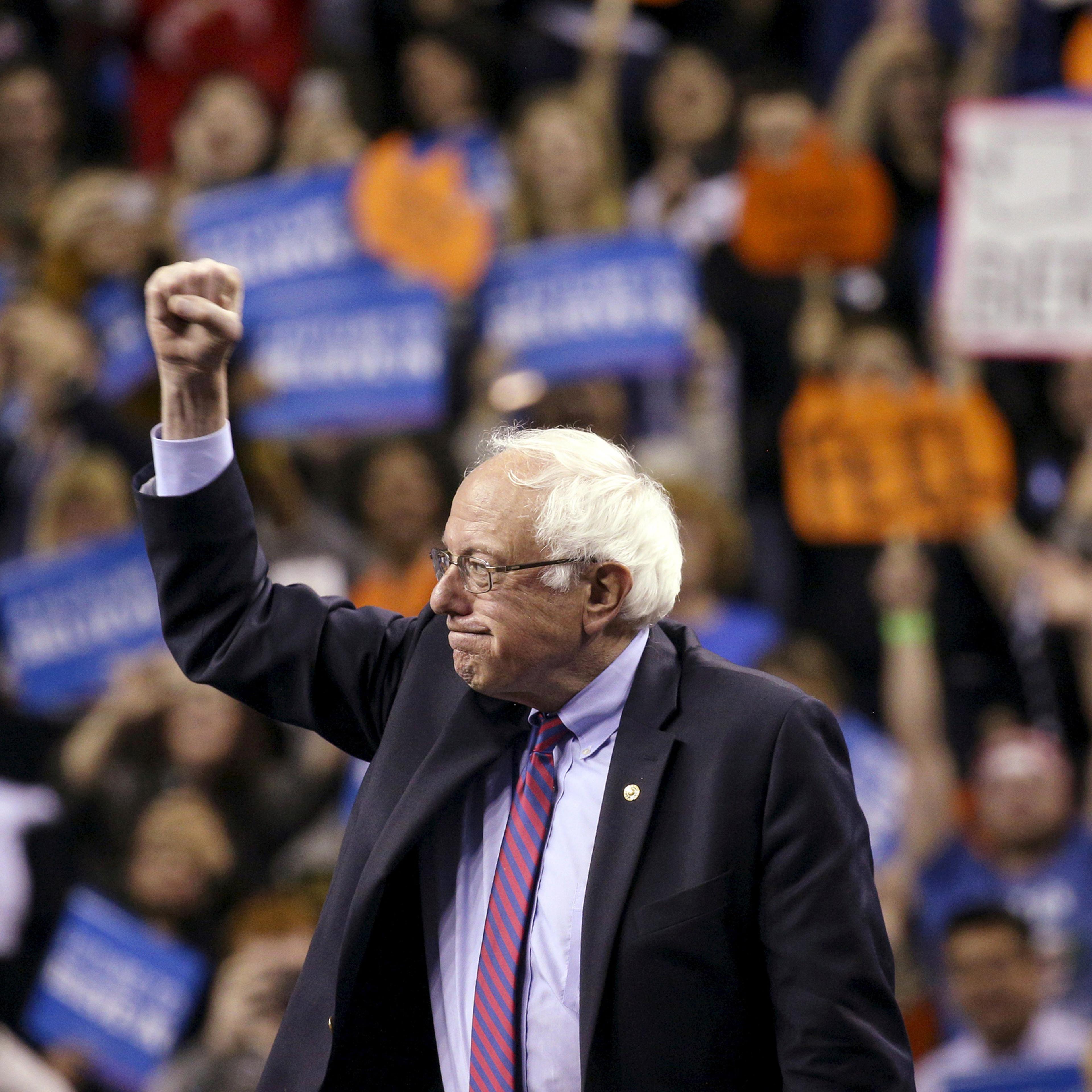 Bernie Sanders greets his supporters as he arrives at a rally at Key Arena in Seattle, Washington, March 20, 2016.
