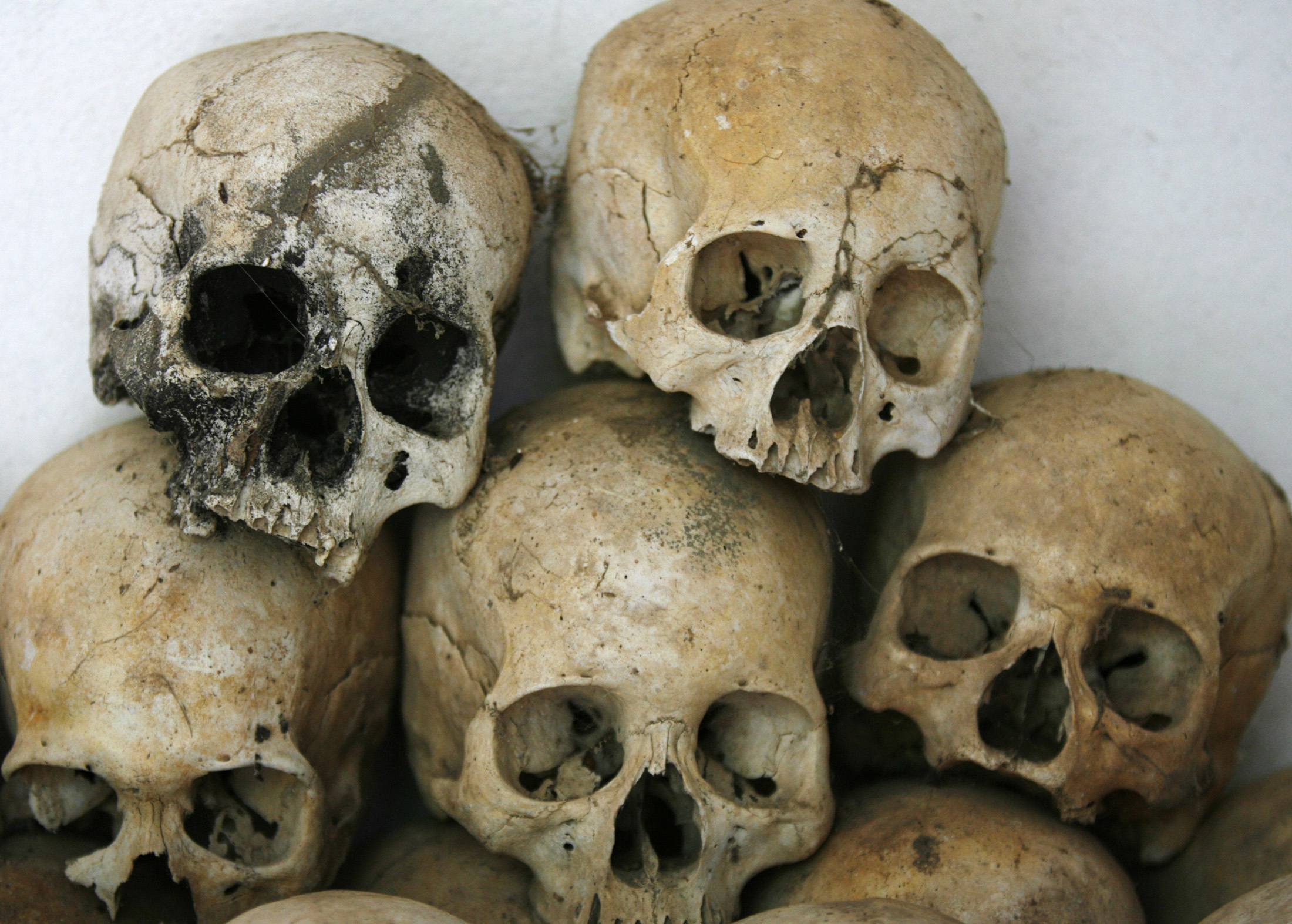 Skulls are stacked on top of each other at a "Killing Fields" memorial in Batey district in Kampong Cham province