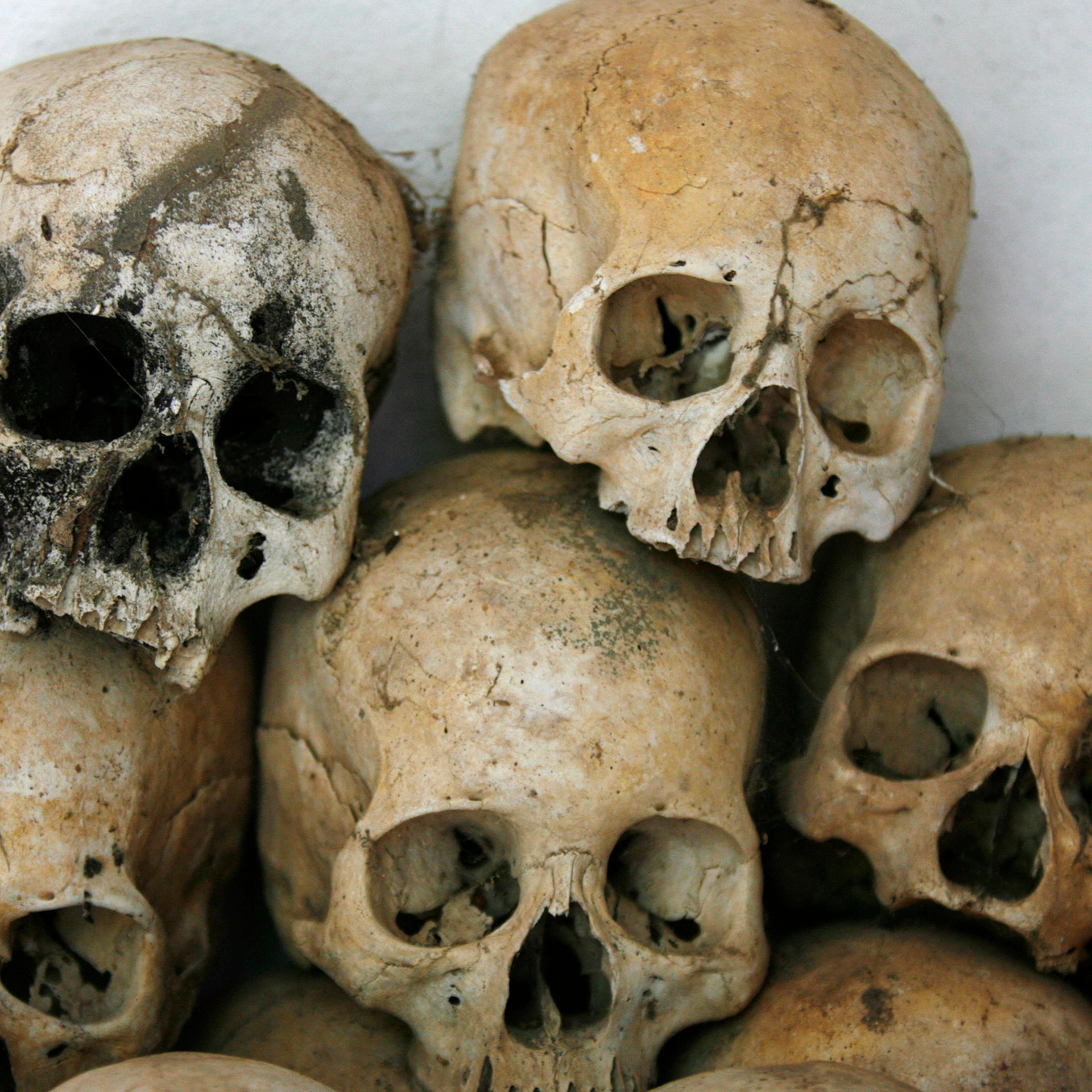 Skulls are stacked on top of each other at a "Killing Fields" memorial in Batey district in Kampong Cham province