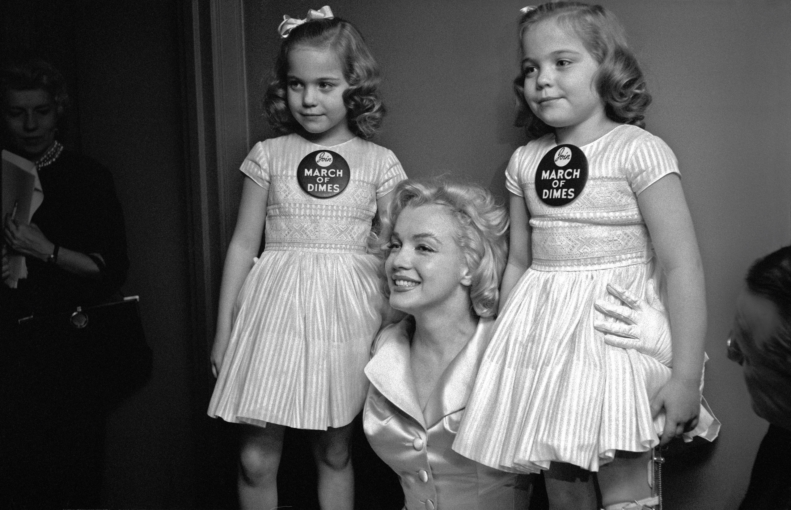 Marilyn Monroe at The March of Dimes Fashion Show, Waldorf Astoria, NYC, 1958.