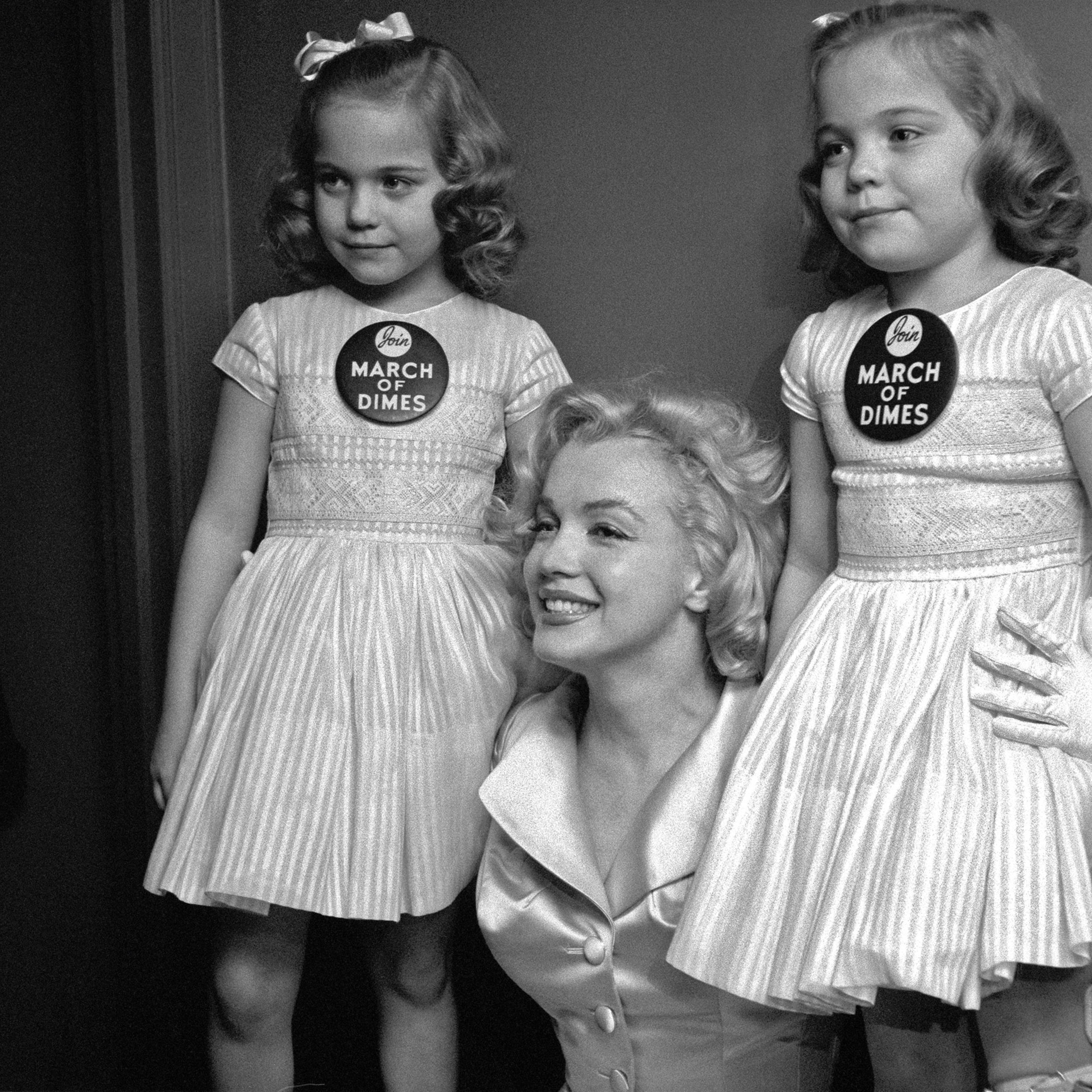 Marilyn Monroe at The March of Dimes Fashion Show, Waldorf Astoria, NYC, 1958.