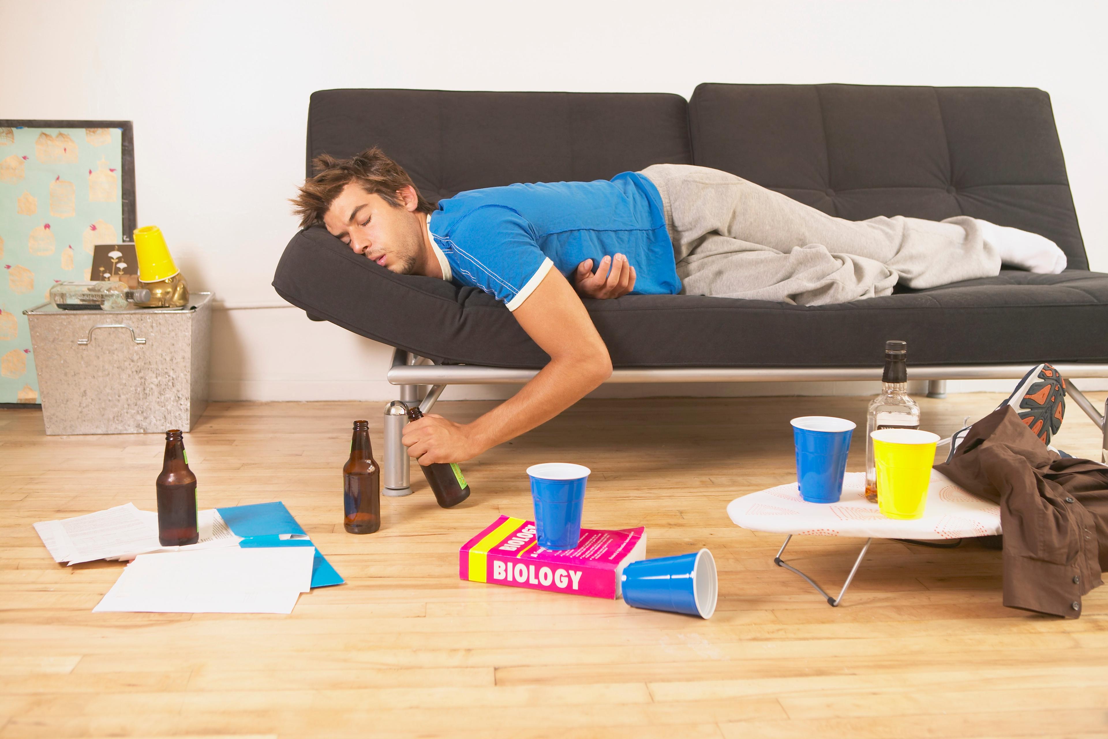 cigarette fatigue Drunk Exhausted Man Smoking Lying on the Floor Stock Photo Want to Cure a Hangover?