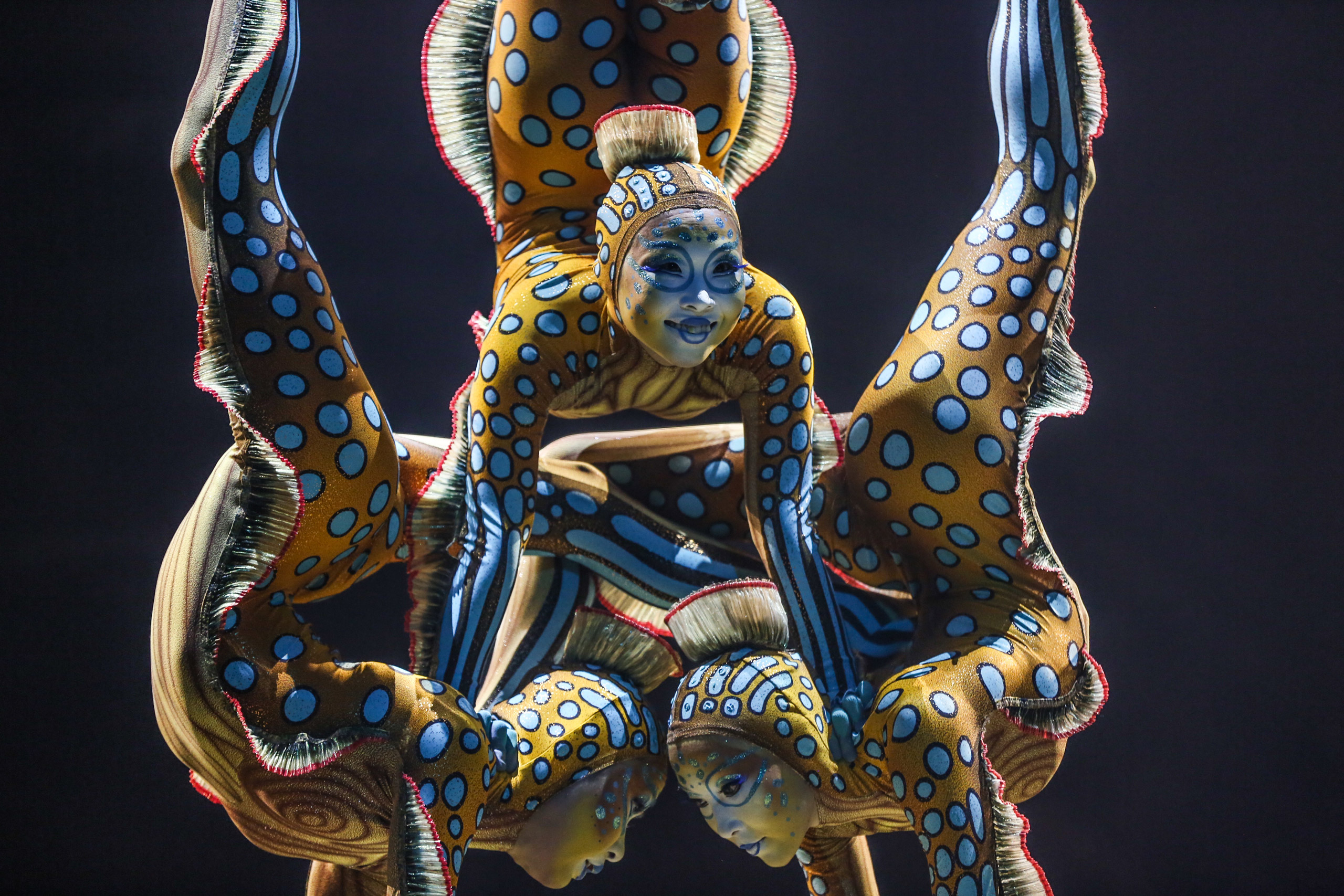 Cast members from Cirque du Soleil perform on stage during the LA Premiere of Cirque du Soleil's "KURIOS - Cabinet of Curiosities" at Dodger Stadium on Wednesday, Dec. 9, 2015, in Los Angeles. (Photo by Rich Fury/Invision/AP)