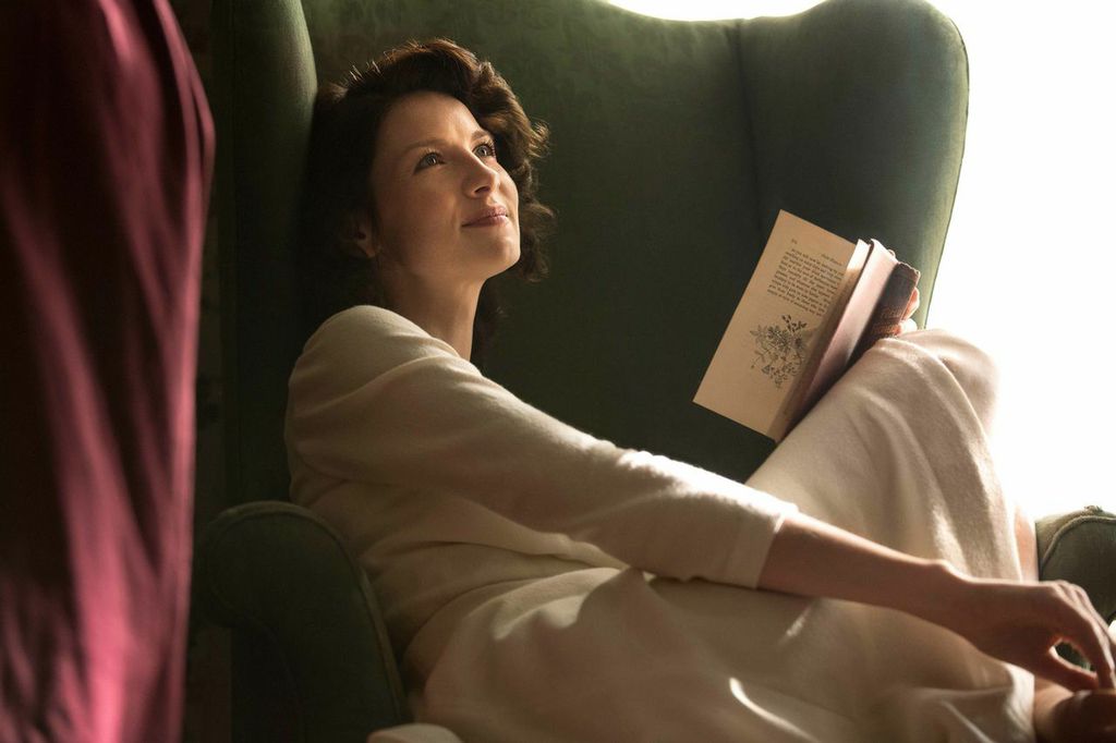 Caitriona Balfe as Claire Randall, transported from 1945 Scotland to 1743 Scotland in Outlander.