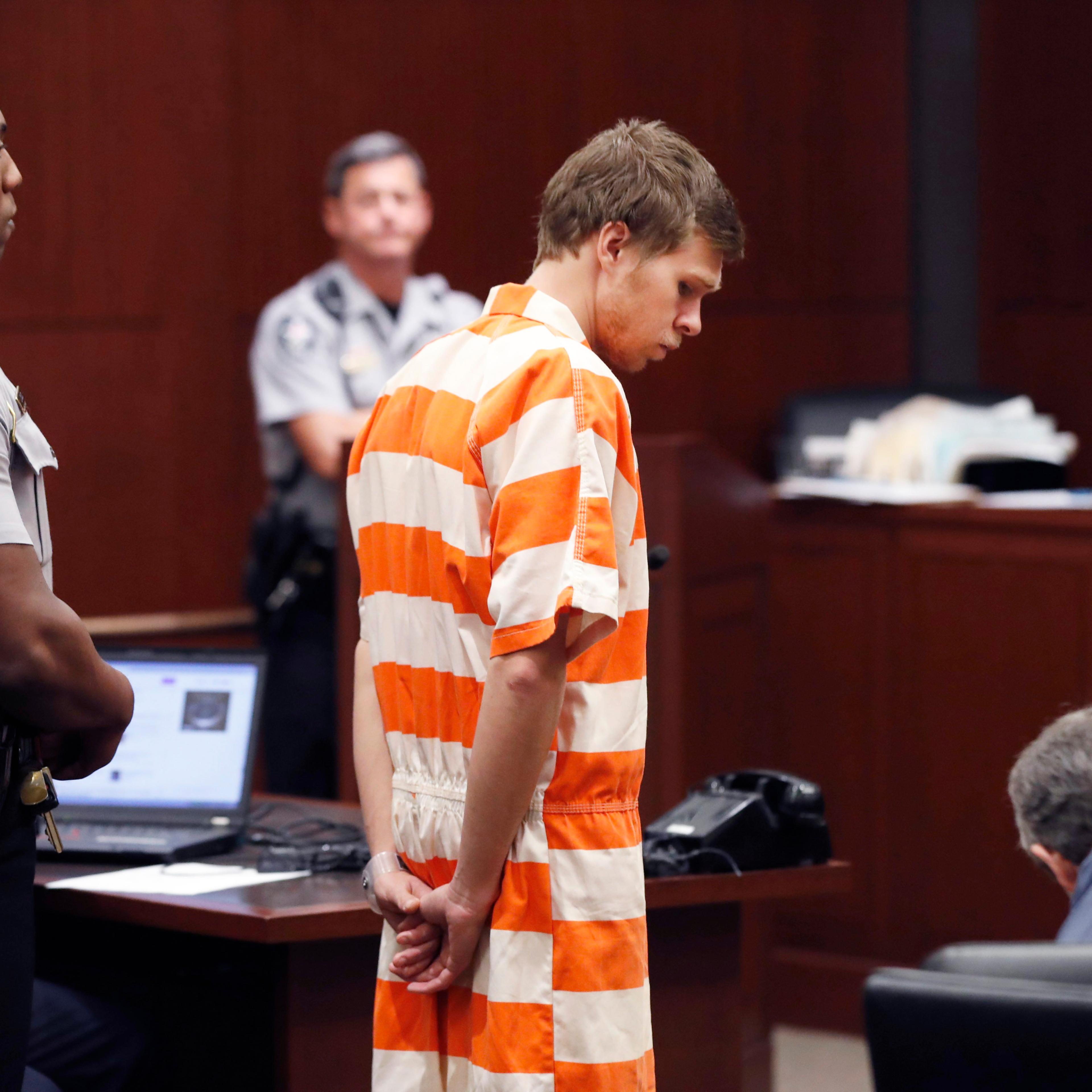 Matthew Phelps stands in the courtroom during his first appearance Tuesday, Sept. 5, 2017, in Raleigh, N.C. Phelps is charged in the death of his wife, Lauren Ashley-Nicole Phelps.