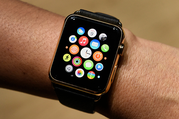 An attendee displays the Apple Watch Edition during the Apple Inc. Spring Forward event in San Francisco, Calif. on March 9, 2015.