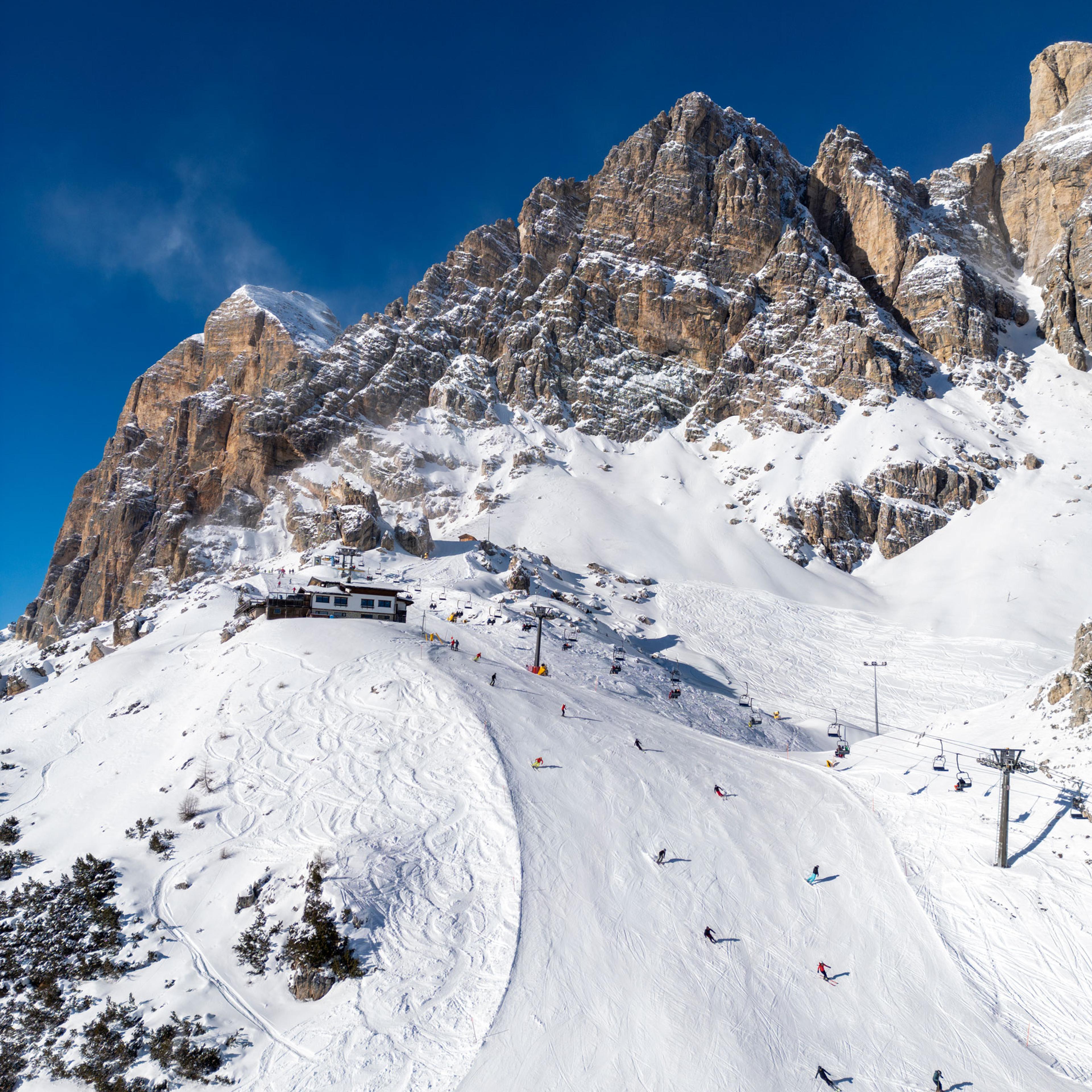 Skiers on the slopes of Cortina d’Ampezzo