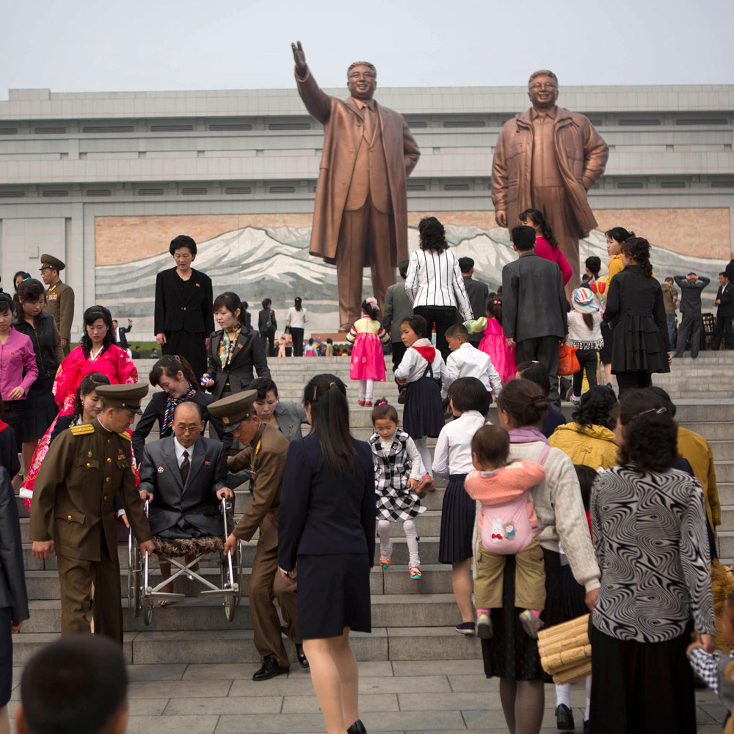 North Koreans arrive at Pyongyang's Mansu Hill
