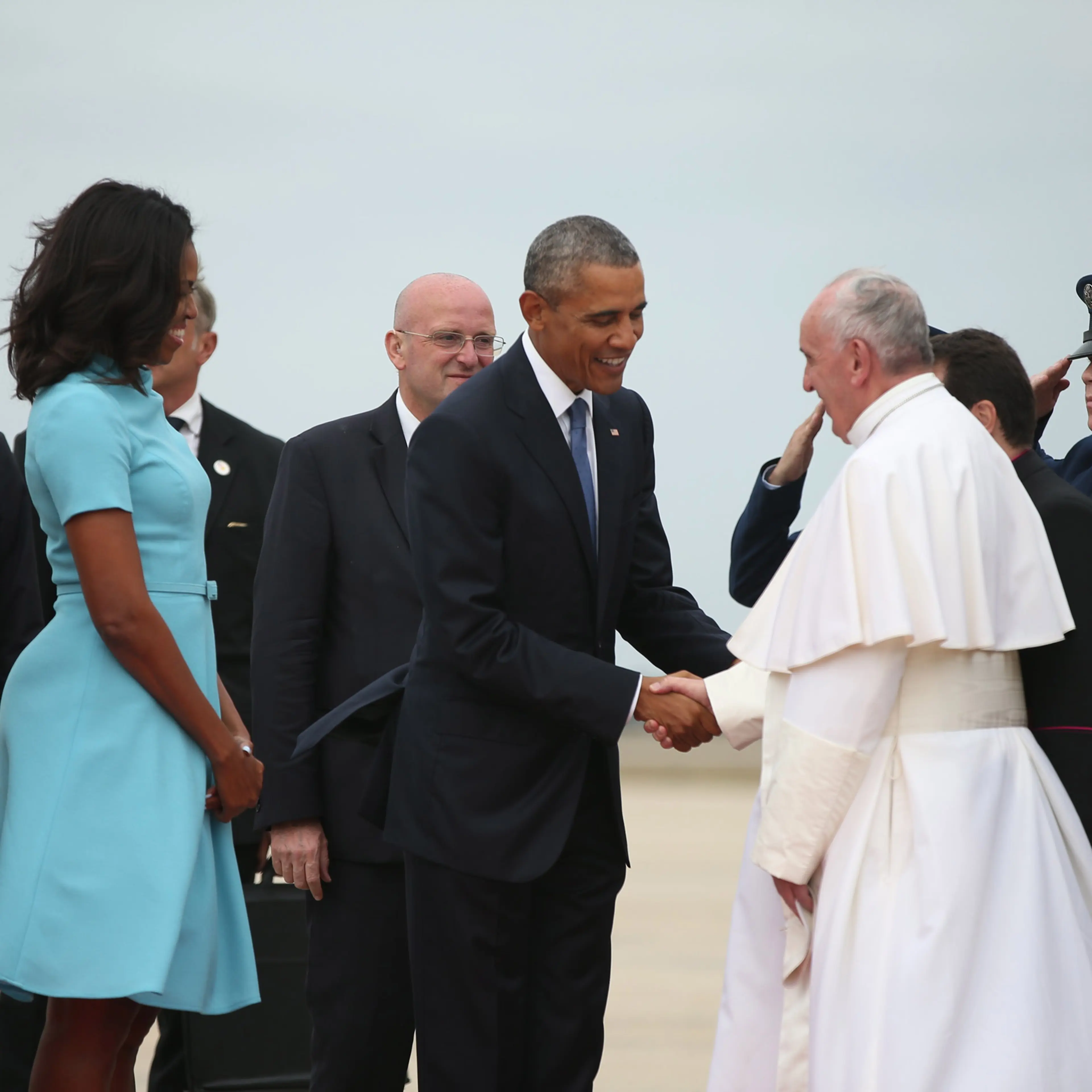 President Barack Obama and first lady Michelle Obama greet Pope Francis upon his arrival at Andrews Air Force Base, Md., Tuesday, Sept. 22, 2015. (AP Photo/Andrew Harnik)