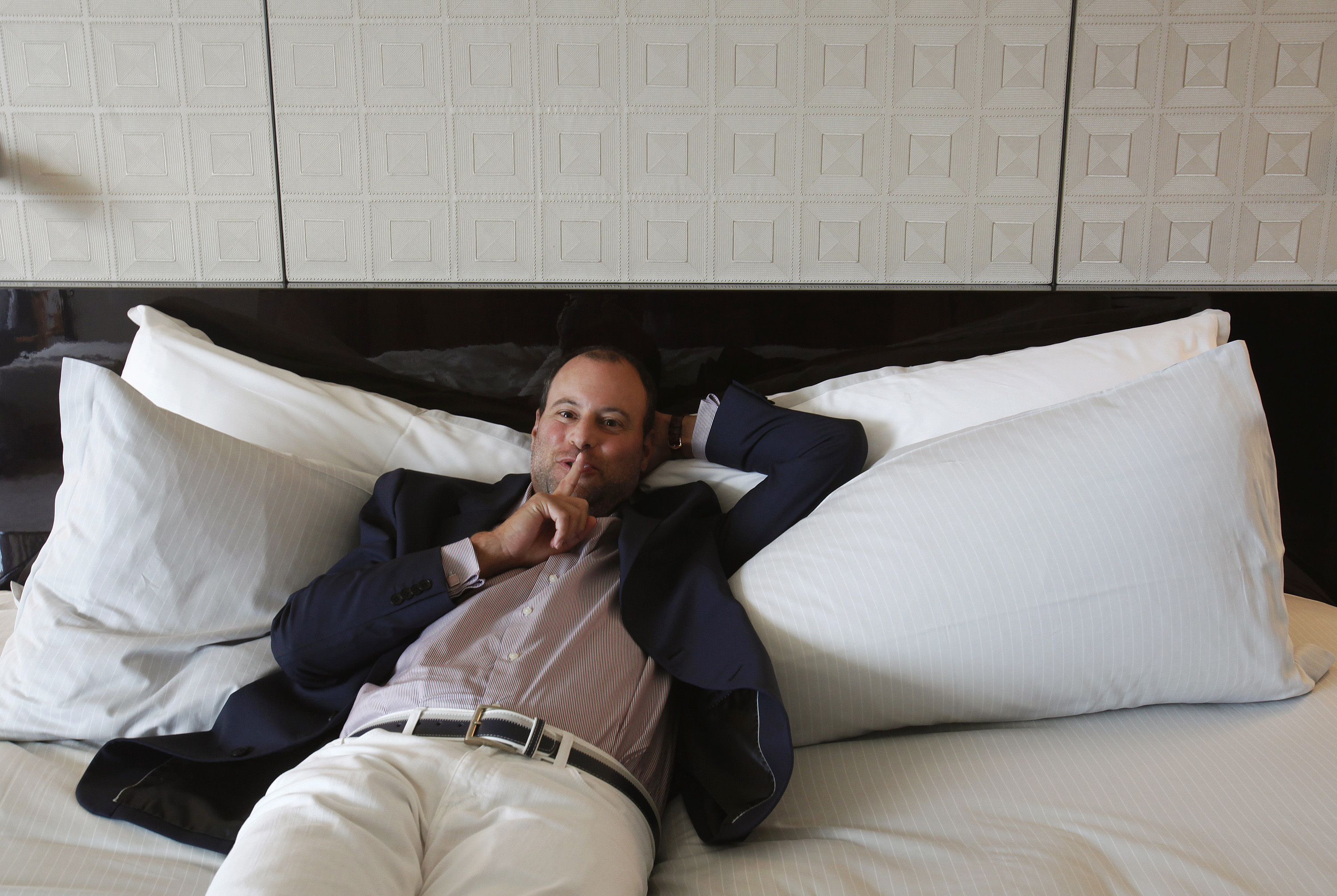 Ashley Madison founder Noel Biderman poses during an interview in Hong Kong