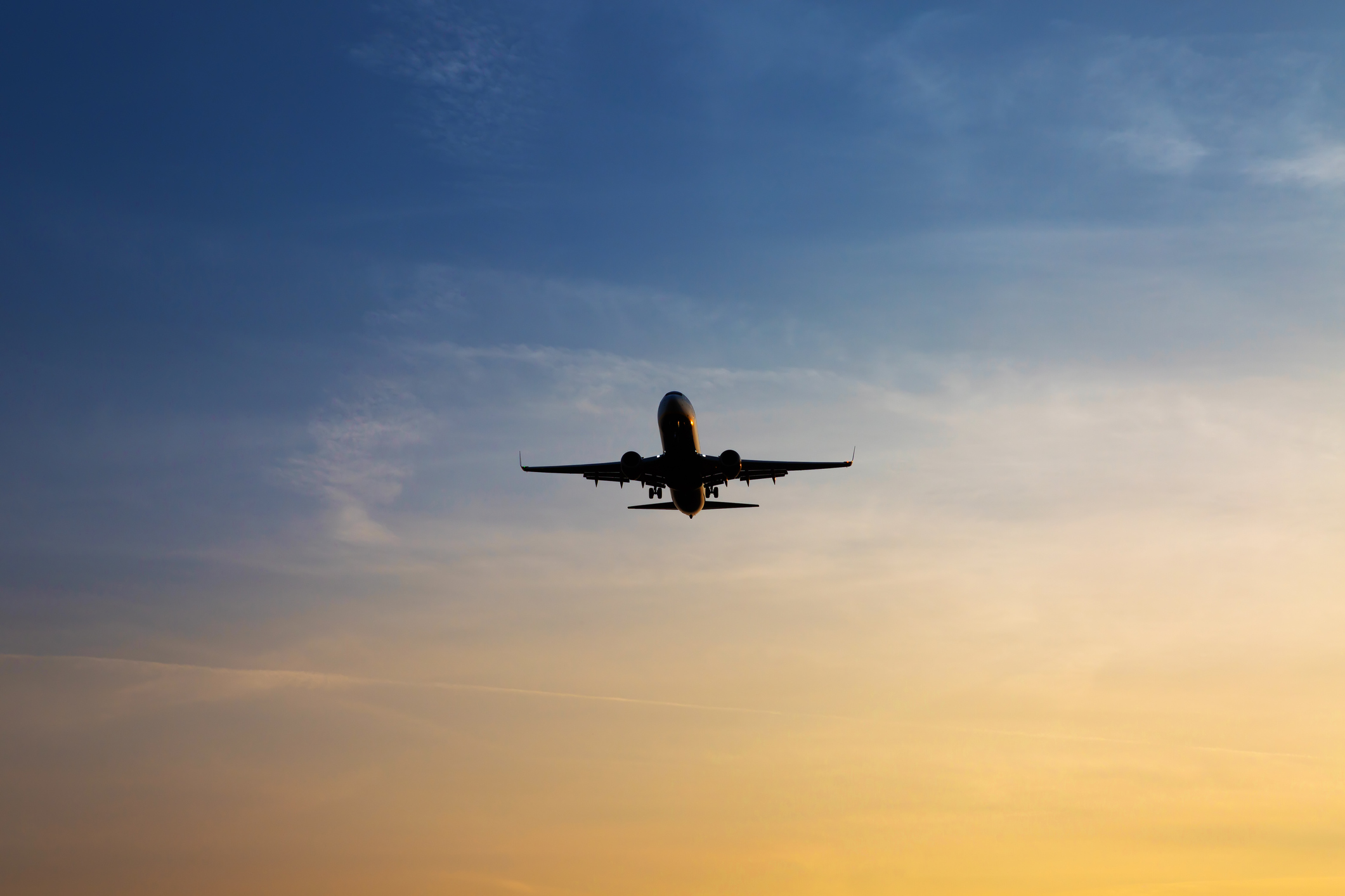 Aircraft in the sky at sunset