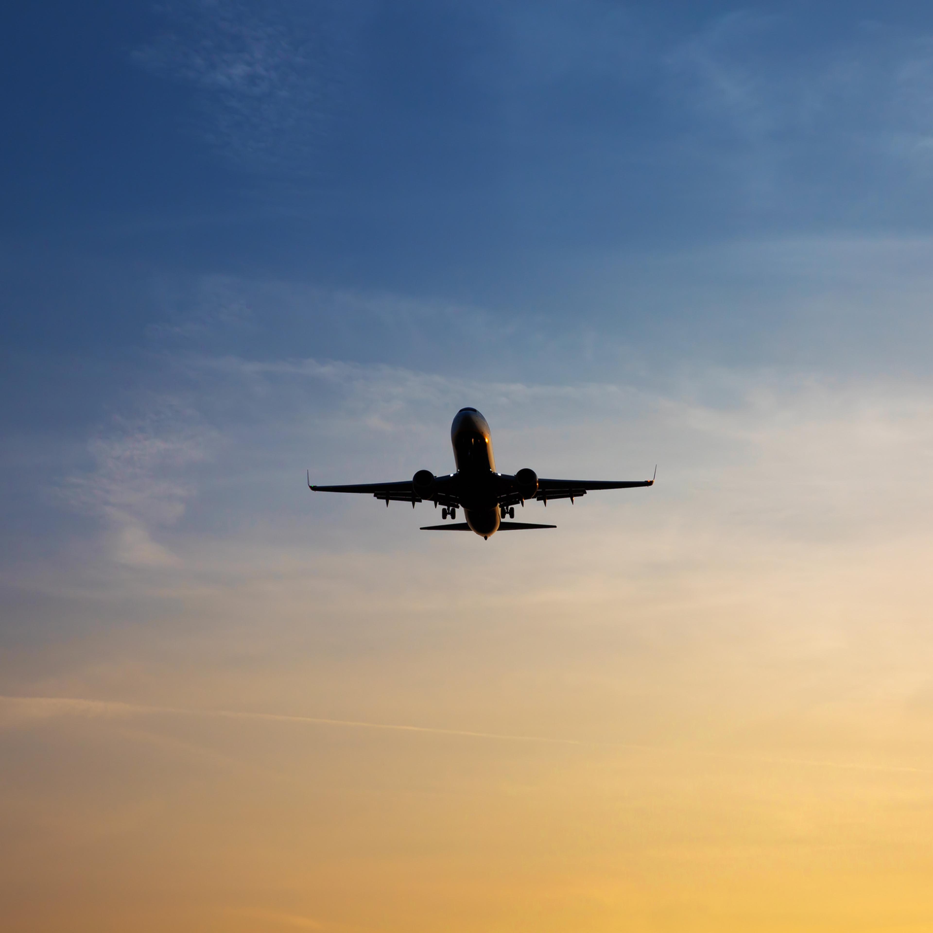Aircraft in the sky at sunset
