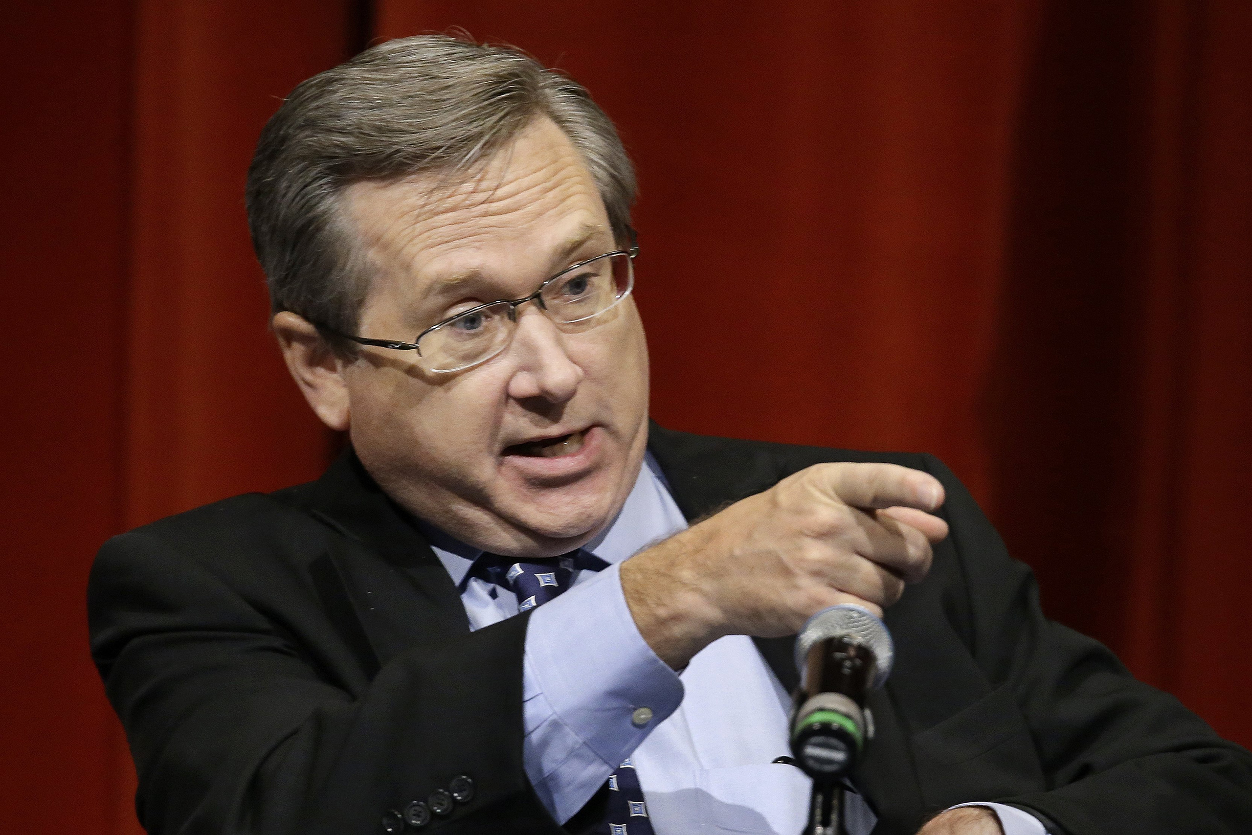 Republican U.S. Sen. Mark Kirk, answers questions during the first televised debate with Democratic U.S. Rep. Tammy Duckworth, in what's considered a crucial race that could determine which party controls the Senate, on Oct. 27, 2016, at the University o
