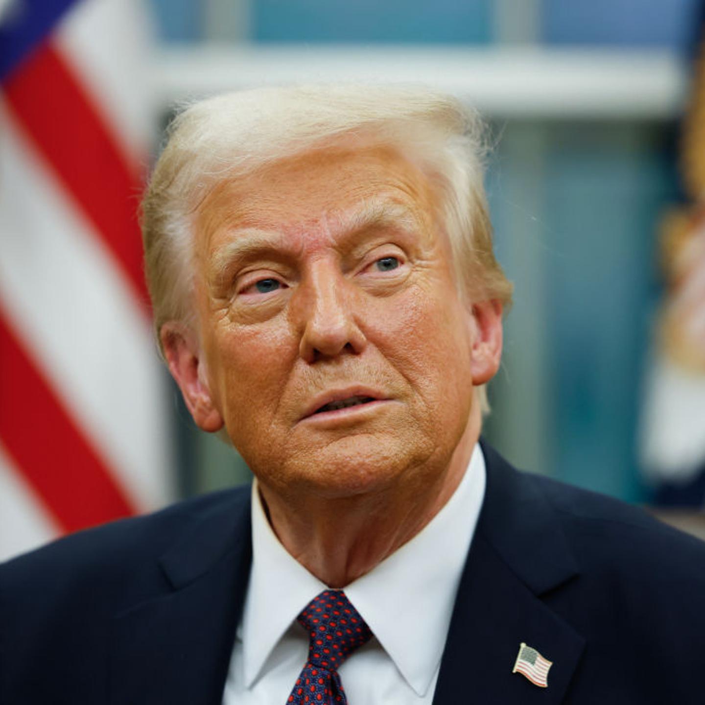 President Donald Trump signs executive orders in the Oval Office in Washington, DC on Jan 20, 2025.