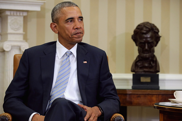 U.S. President Barack Obama announces his appointment of former IBM CEO Sam Palmisano and Tom Donilon to the the newly-created Commission on Enhancing National Cybersecurity in the Oval Office at the White House on Feb. 17, 2016.