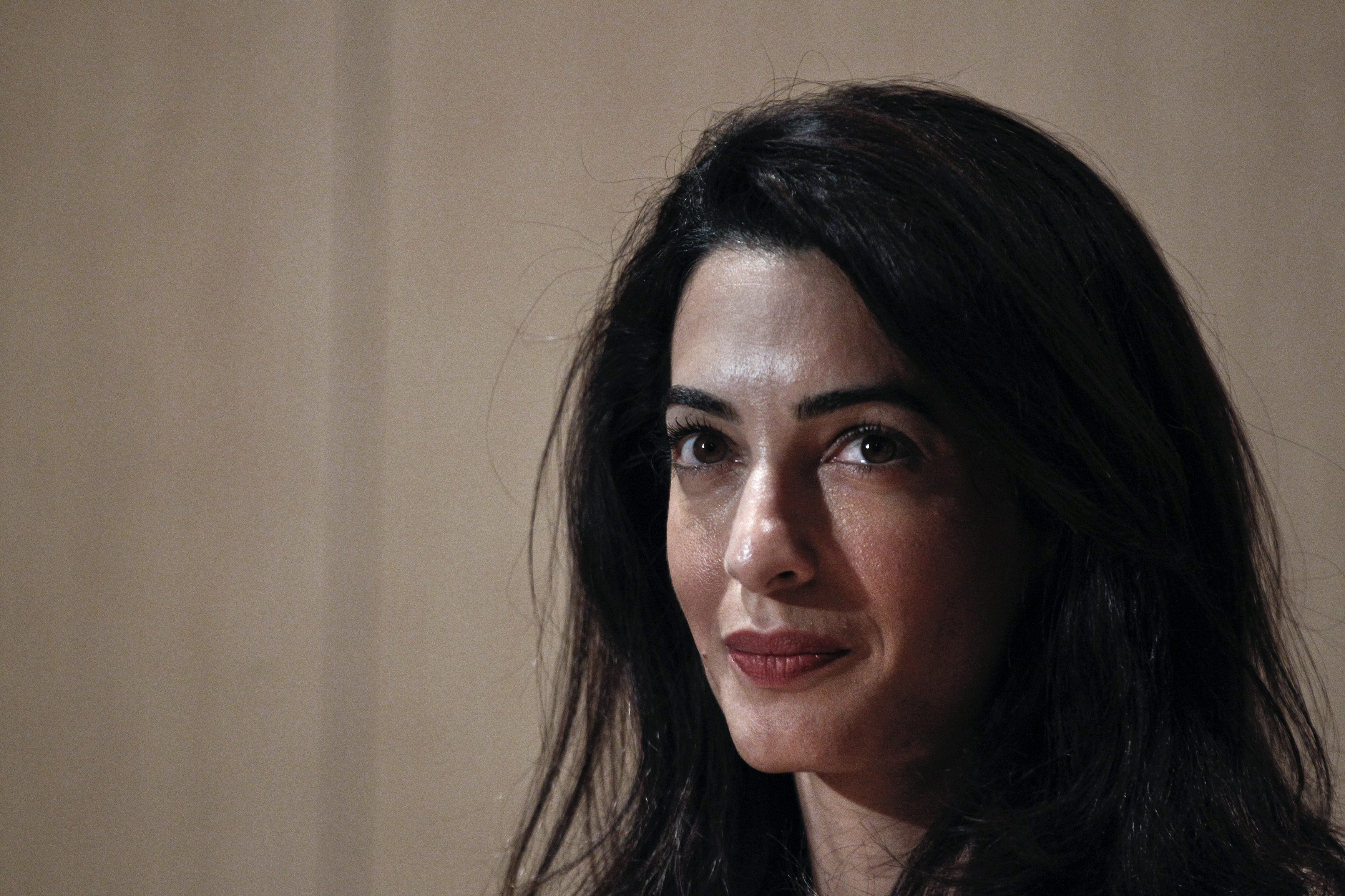 Human rights lawyer Amal Alamuddin Clooney looks on during a news conference at the Acropolis museum in Athens