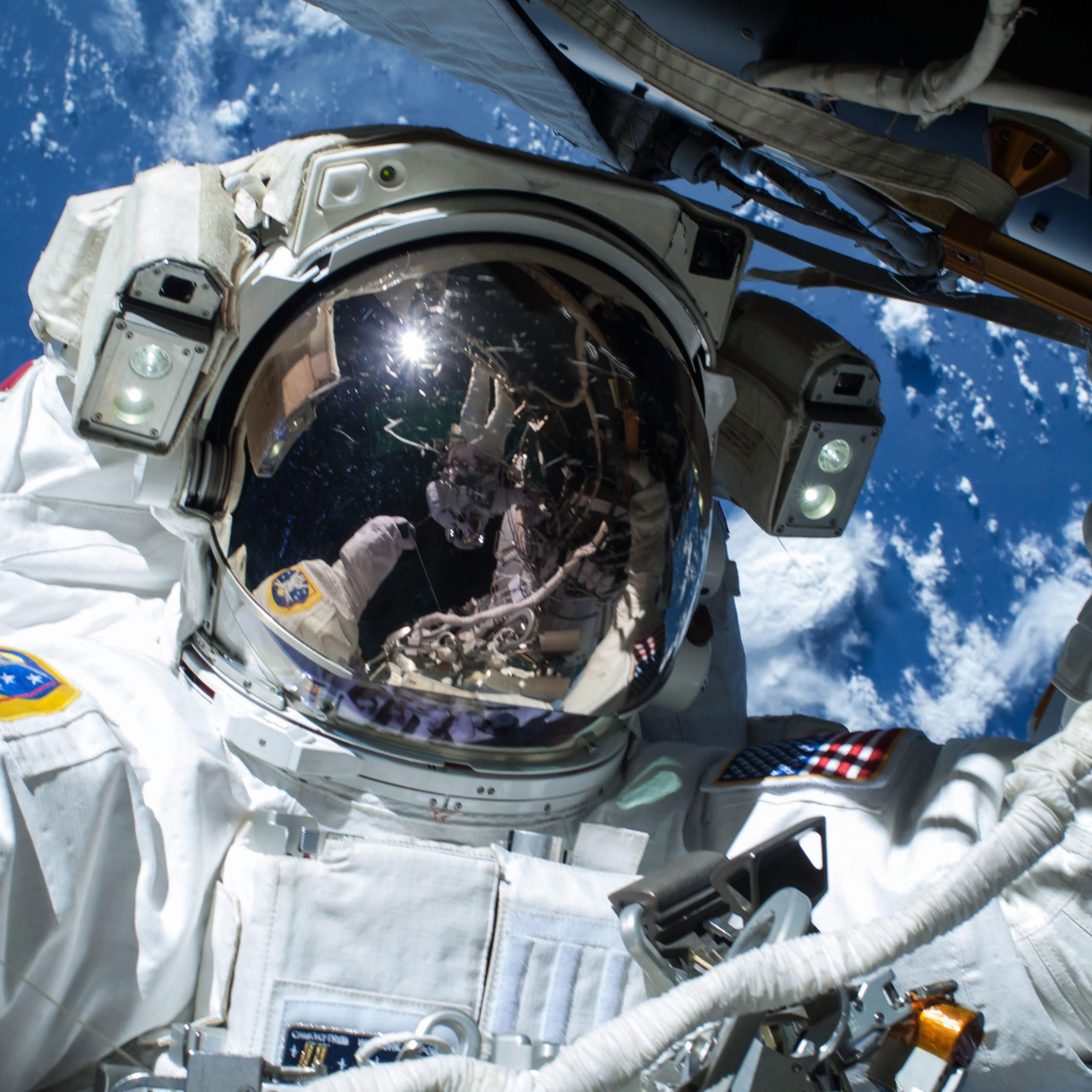 NASA astronaut Barry Wilmore operating outside the International Space Station (ISS) on the first of three spacewalks preparing the station for future arrivals by US commercial crew spacecraft, in space, 21 Feb. 21, 2015.
