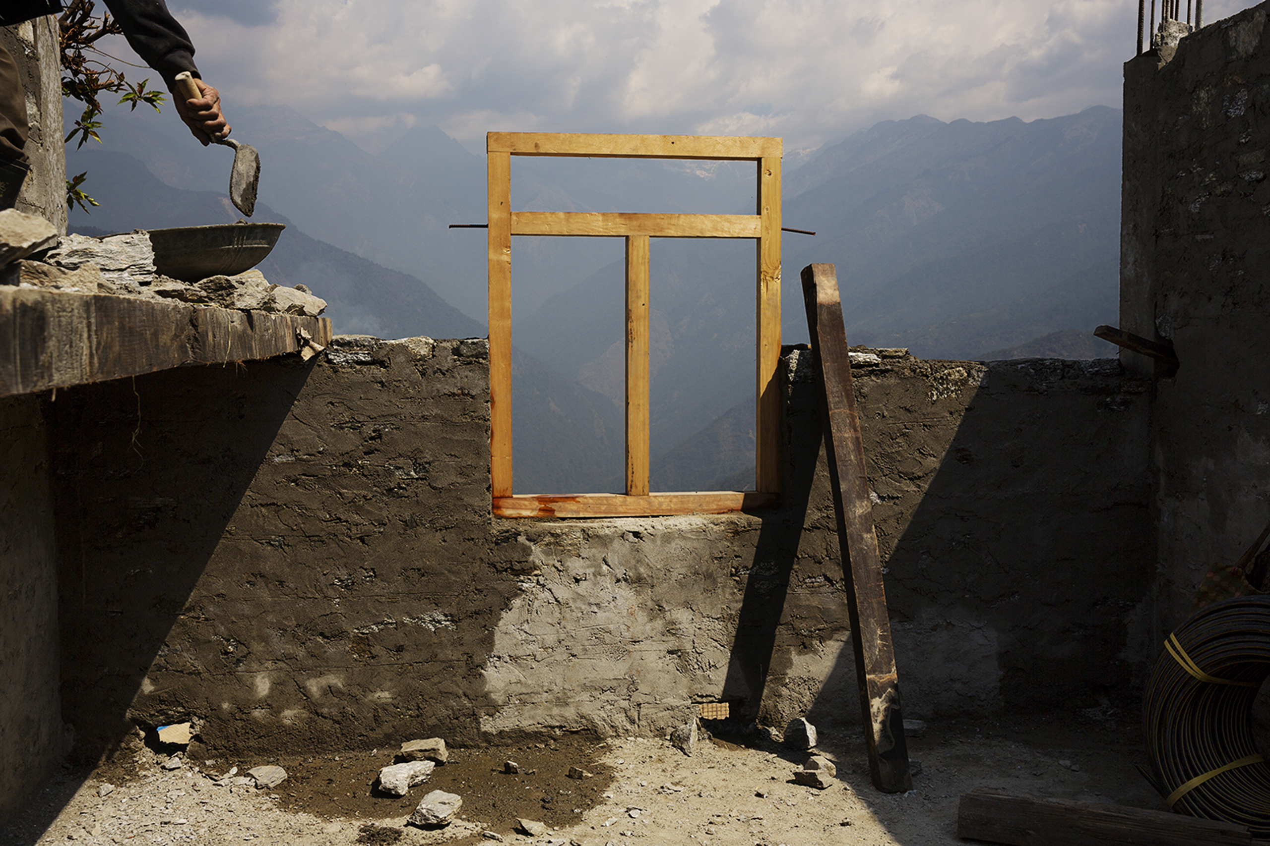 Approaching the first anniversary of Nepal's 2015 quakes, money from international donors has yet to reach victims. A political fight overtook reconstruction efforts, leaving villagers in communities like Barpak, needing to rebuild on their own, April 7,