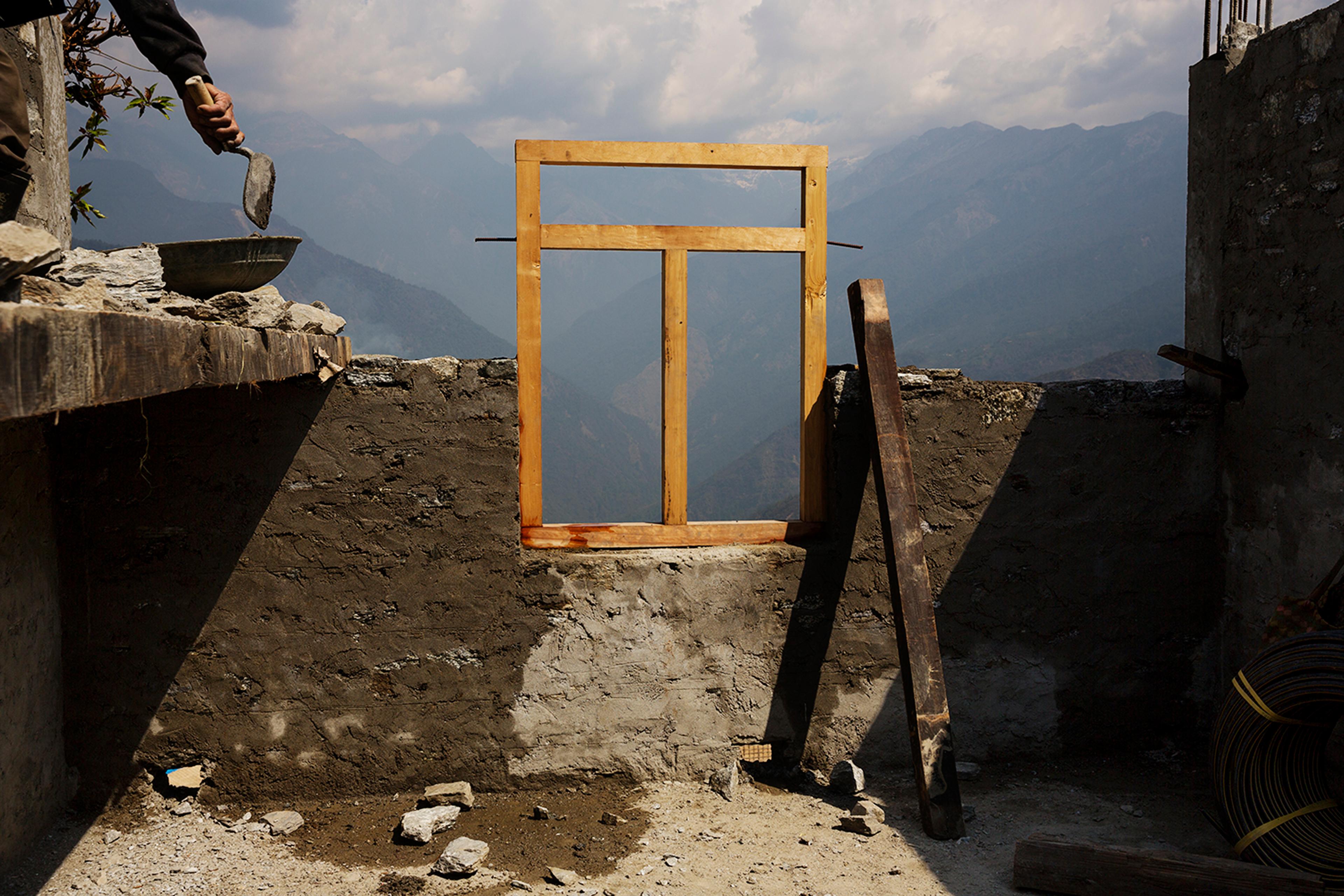 Approaching the first anniversary of Nepal's 2015 quakes, money from international donors has yet to reach victims. A political fight overtook reconstruction efforts, leaving villagers in communities like Barpak, needing to rebuild on their own, April 7,