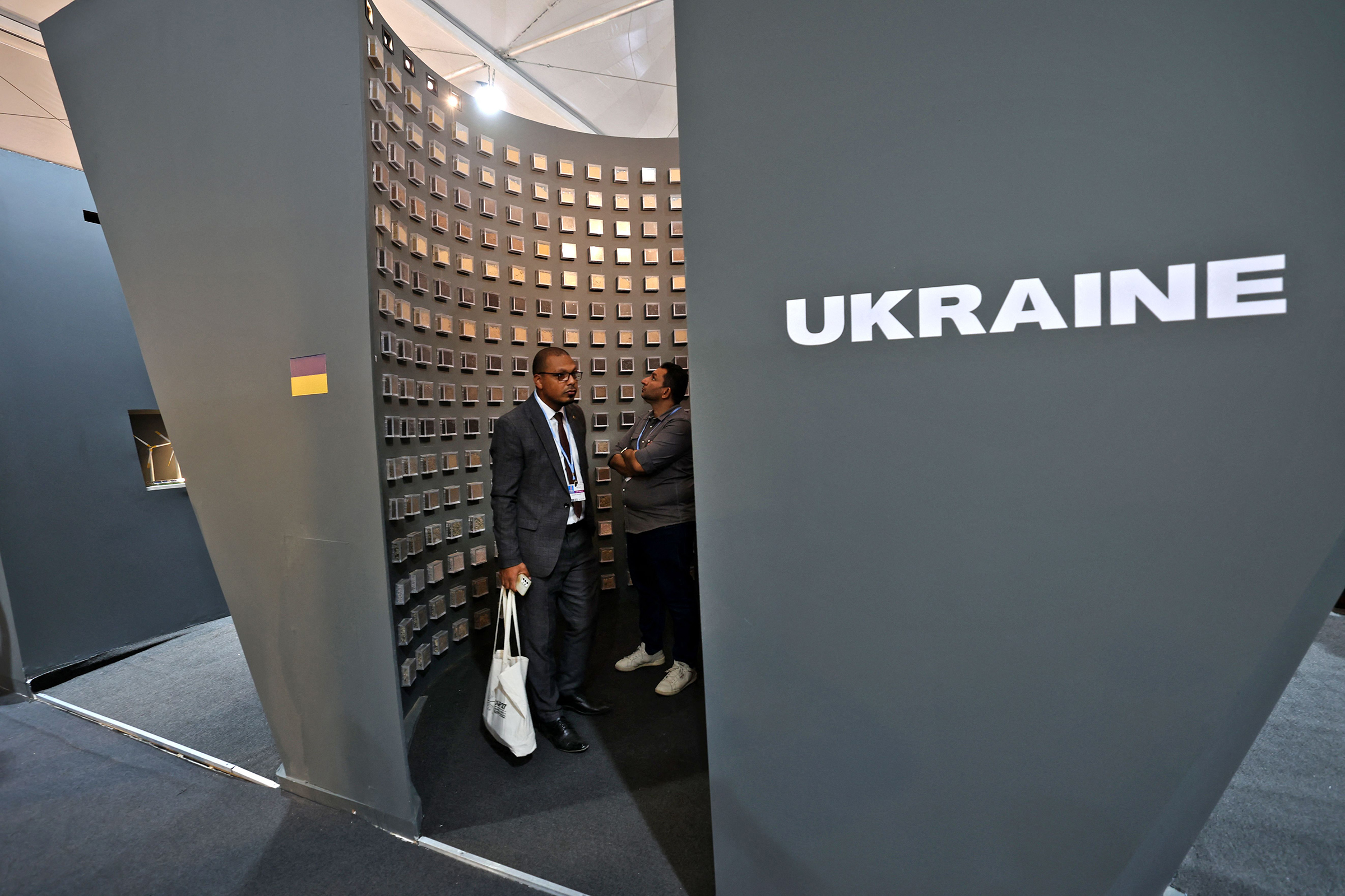 Participants visit the Ukraine pavilion at the Sharm el-Sheikh International Convention Centre during the COP27 climate conference on Nov. 14.