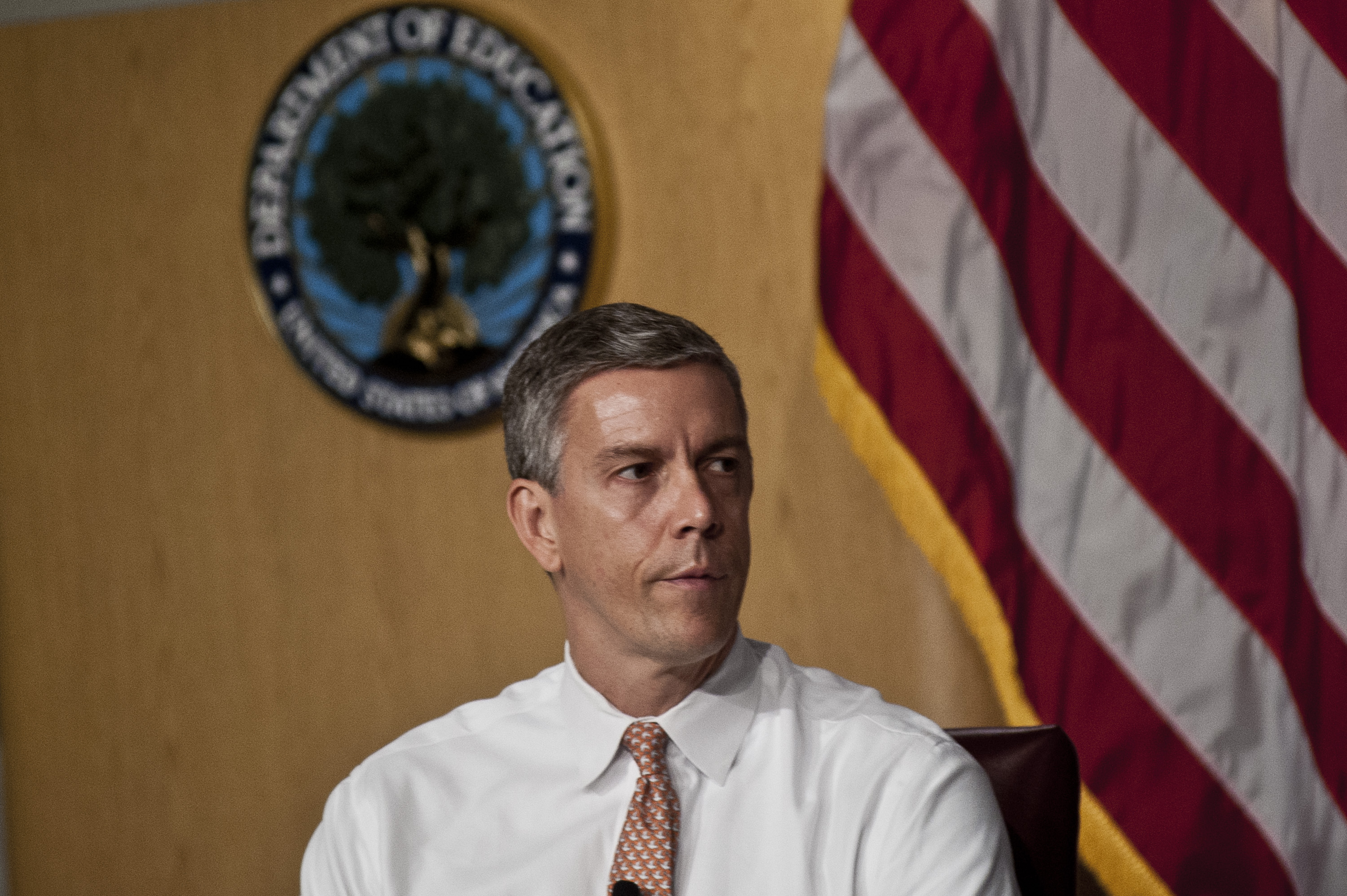 Arne Duncan at the "Let's Read. Let's Move" summer reading event series in Washington on July 18, 2012.