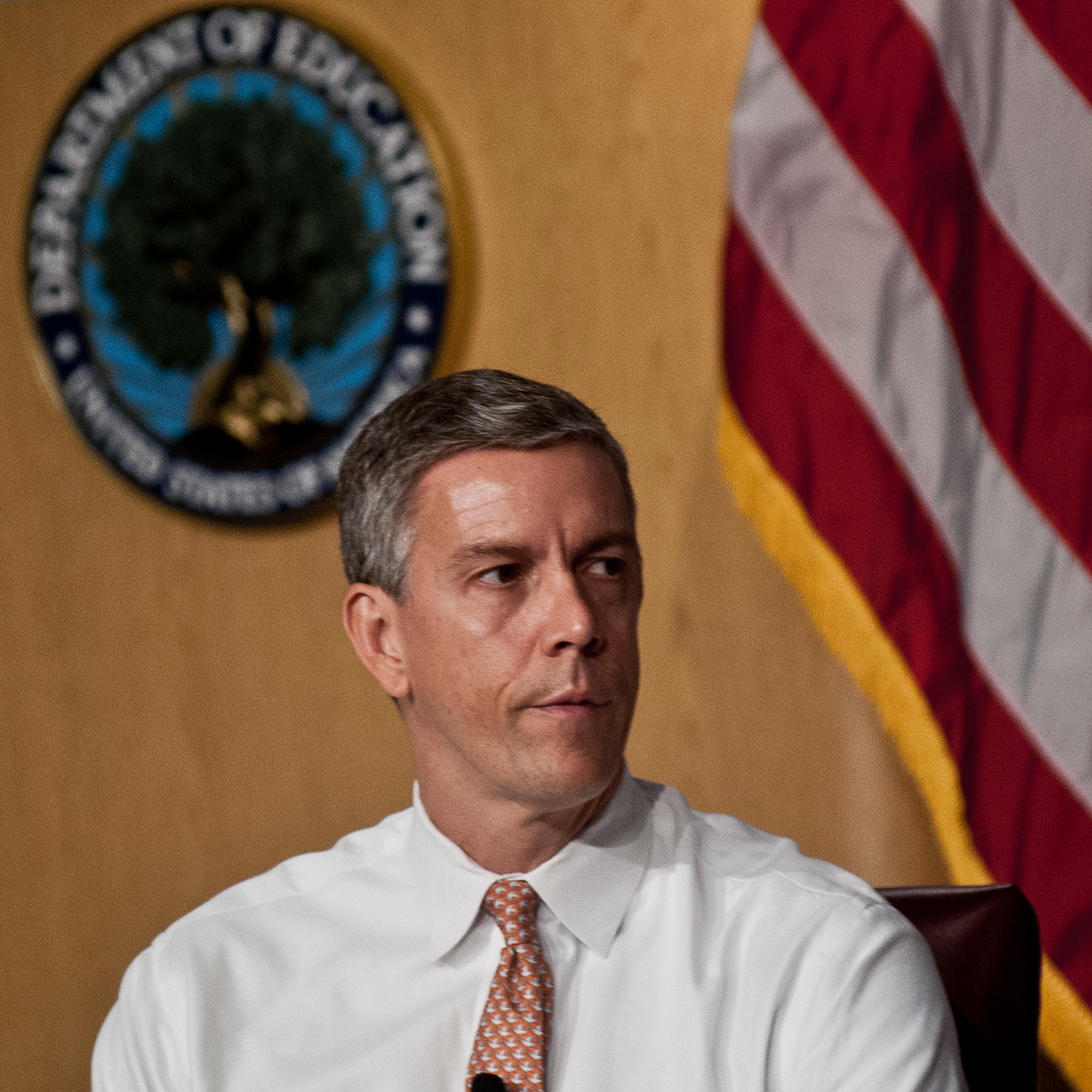 Arne Duncan at the "Let's Read. Let's Move" summer reading event series in Washington on July 18, 2012.