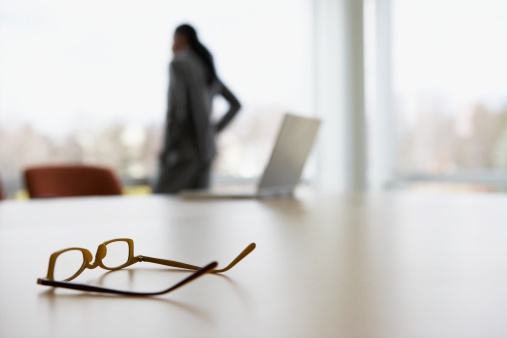 businesswoman-standing-glasses