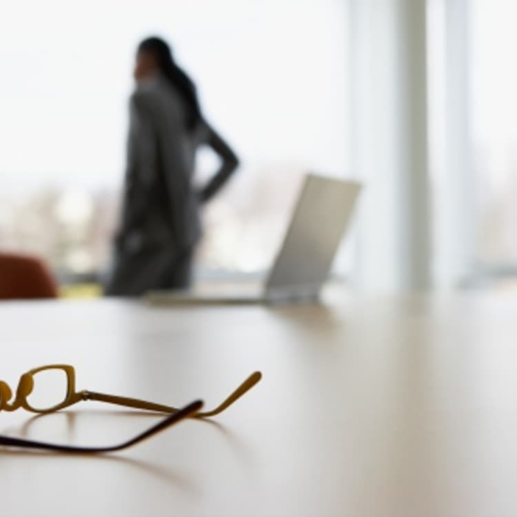 businesswoman-standing-glasses