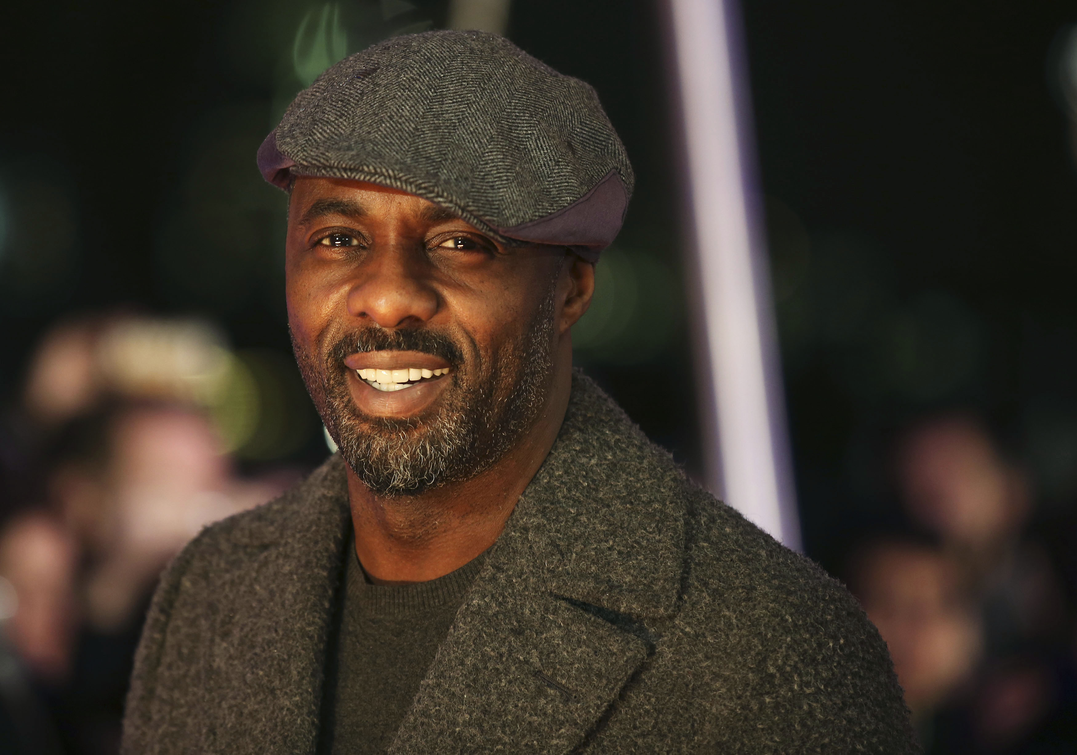 Cast member Idris Elba arrives for the world premiere of the movie 'The Gunman' in London on Feb. 16, 2015.