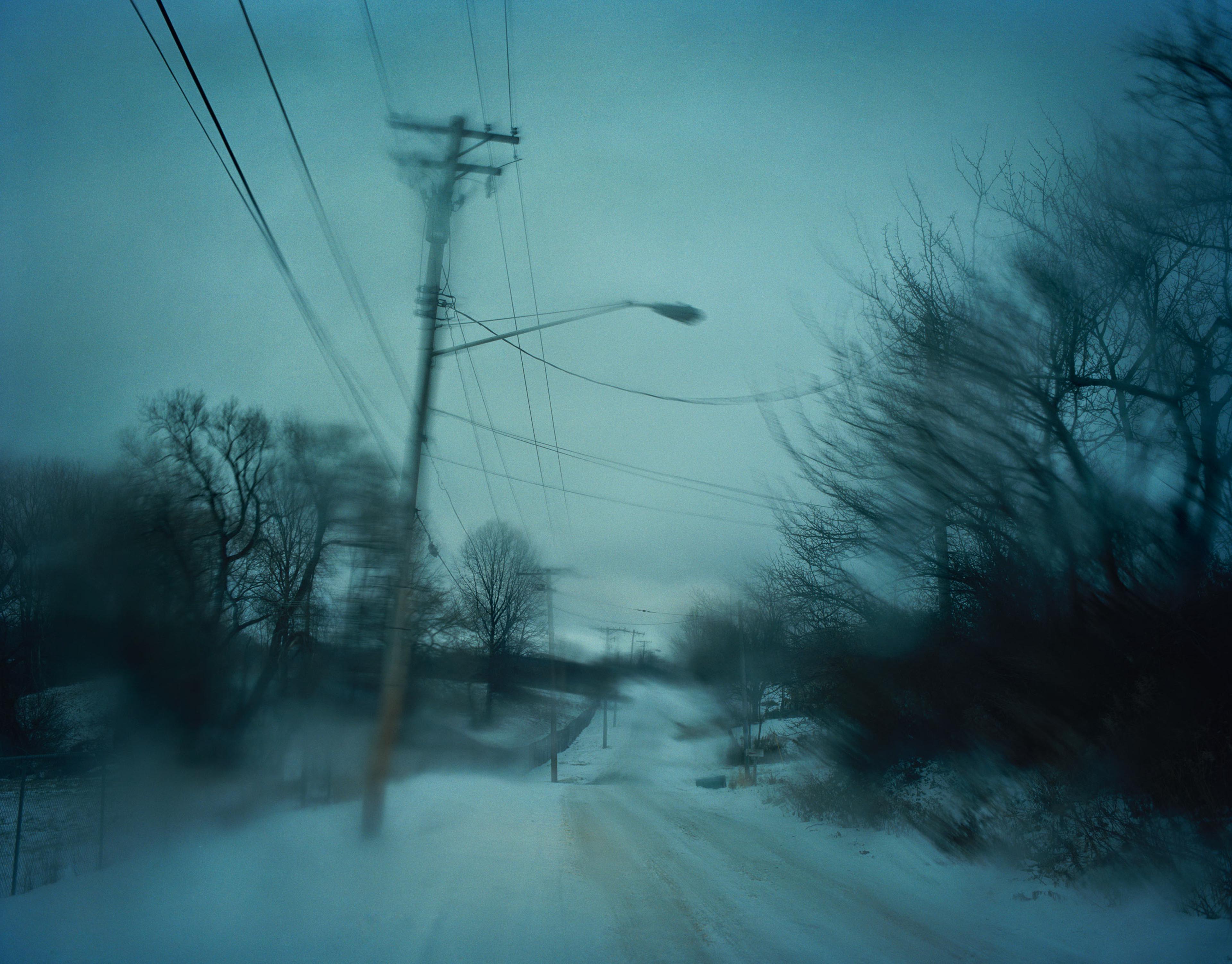 Todd Hido has recently added digital cameras to his equipment. Still he uses three to four cameras, both analog and digital, when shooting, for the different aesthetics they present. For this landscape photograph, Hido used an analog camera, a Pentax 67.