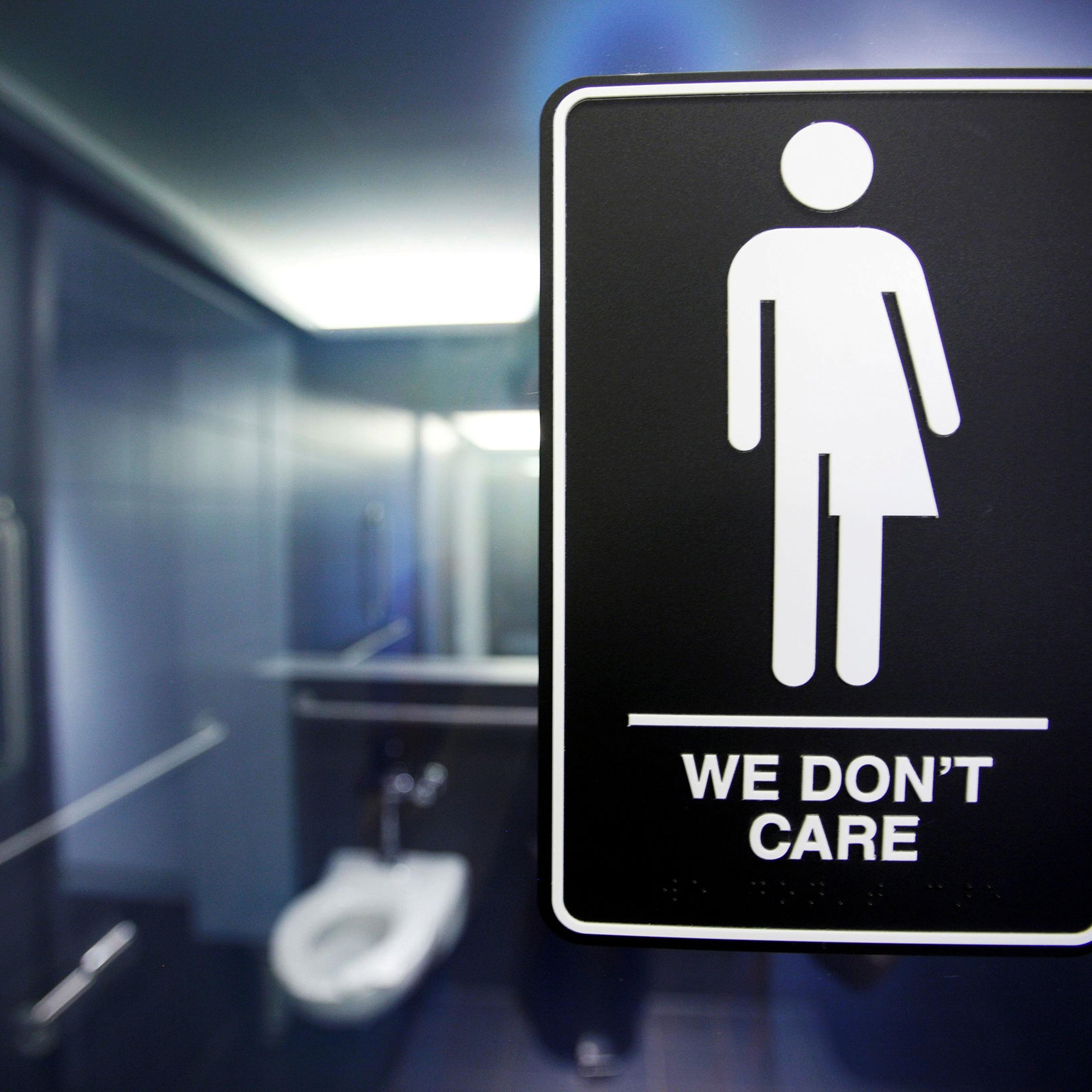 Neutral bathroom signs in public facilities indicate to patrons they are free to pee, regardless of their gender