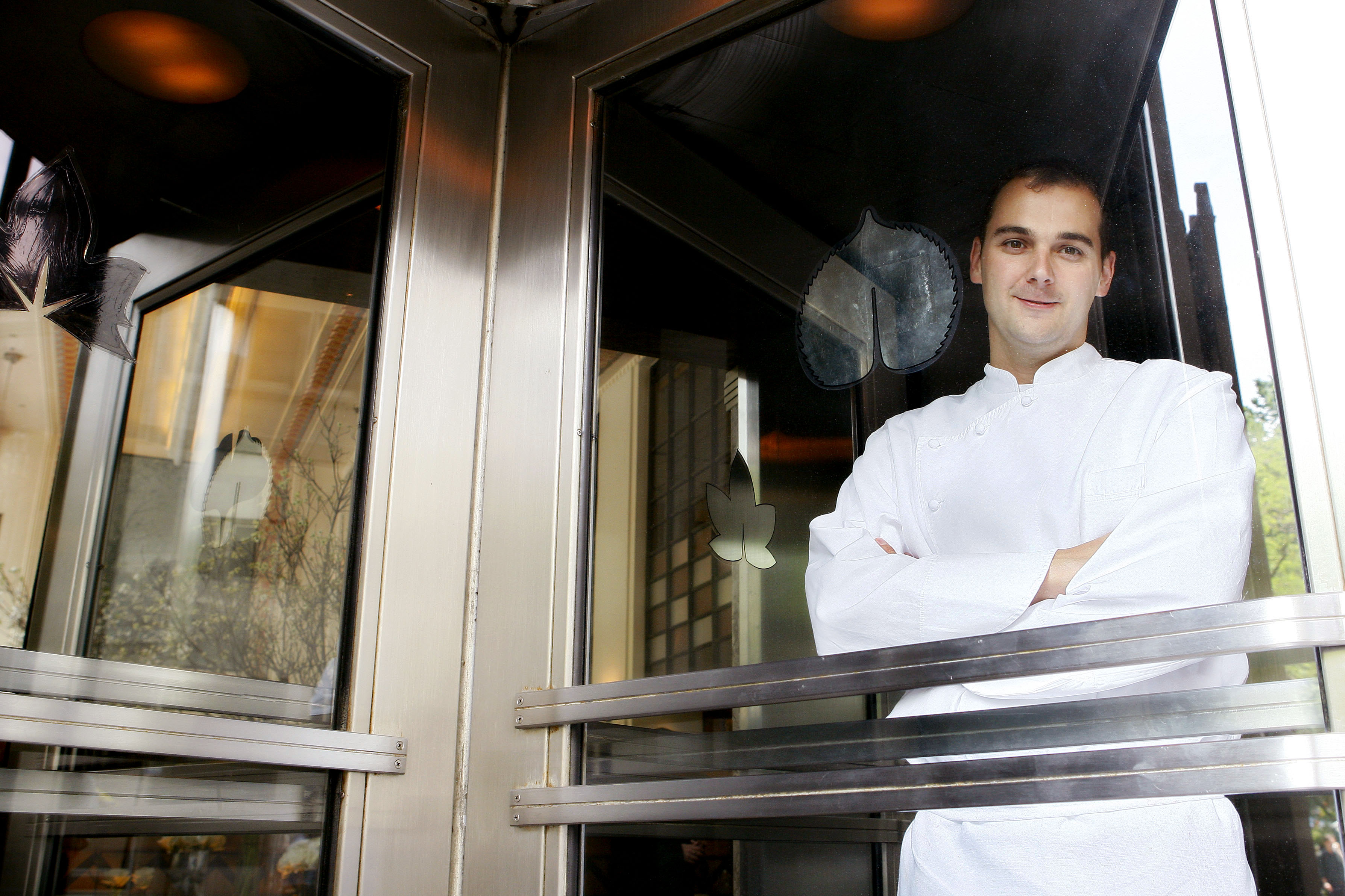 Head chef Daniel Humm stands for a portrait in the entrance