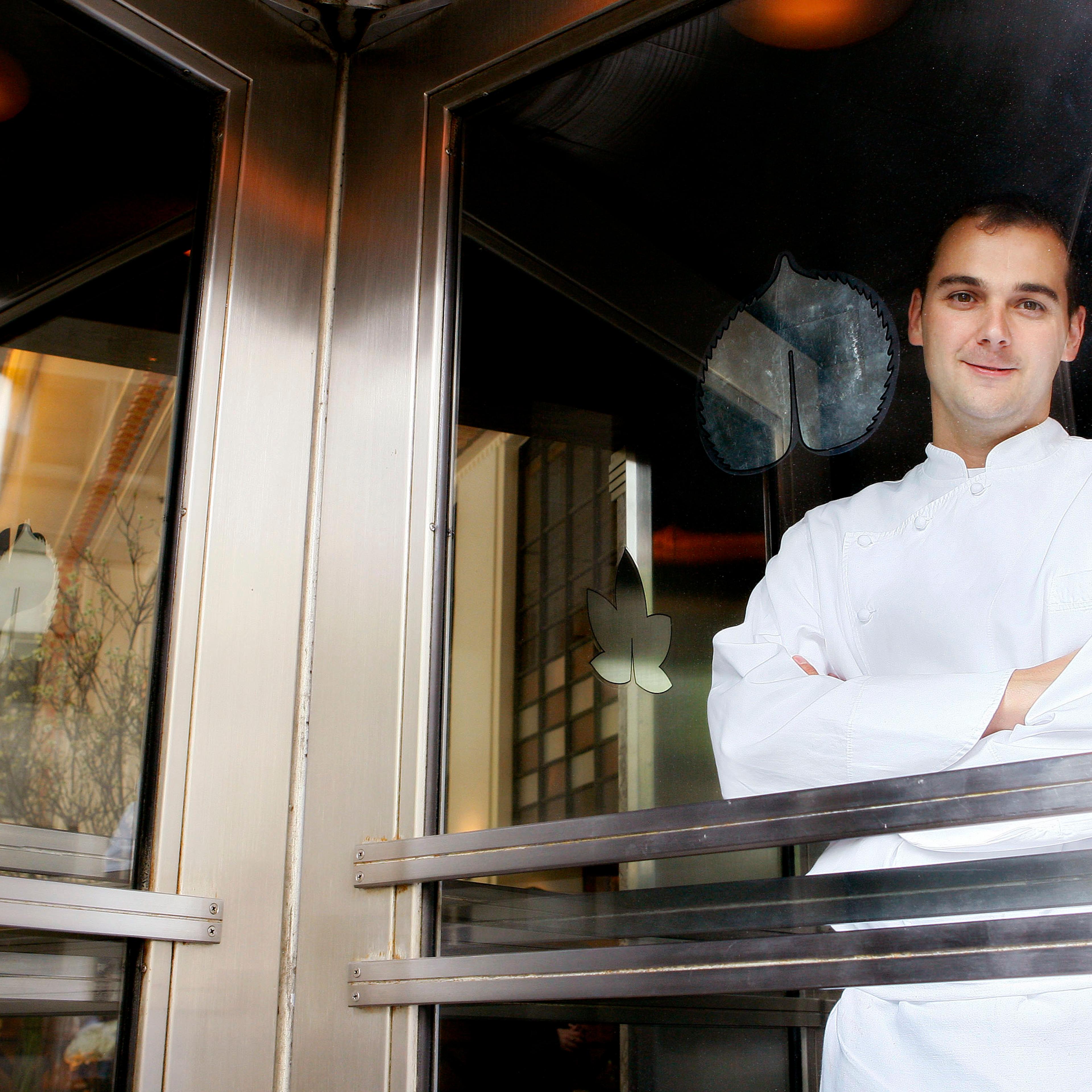 Head chef Daniel Humm stands for a portrait in the entrance