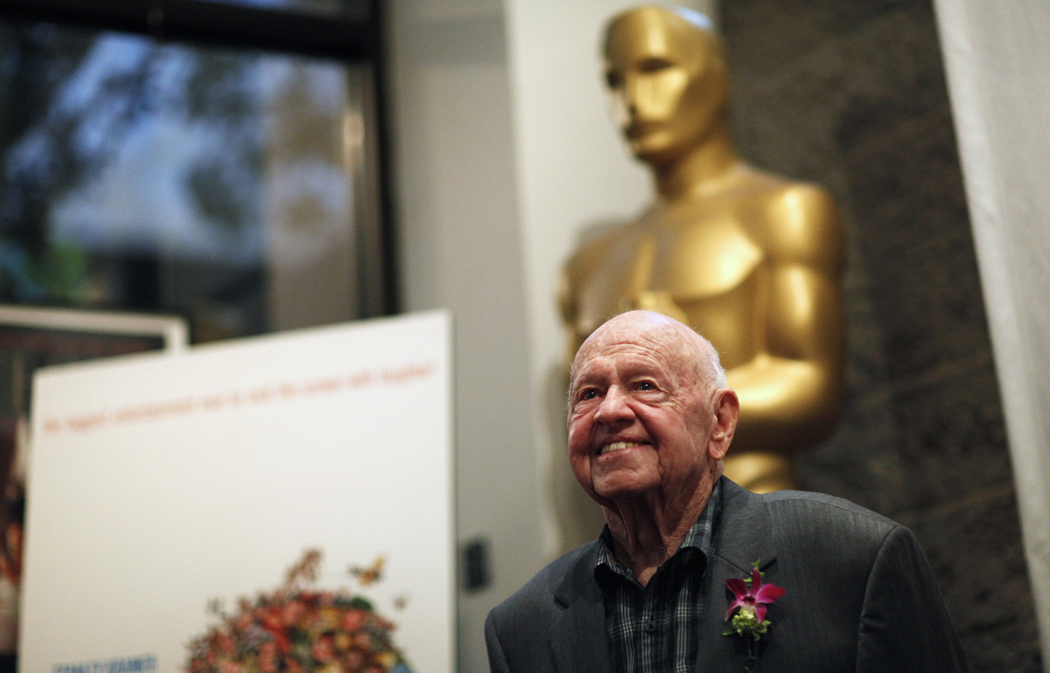 Cast member Rooney poses at a screening of "It's a Mad Mad Mad Mad World" in Beverly Hills
