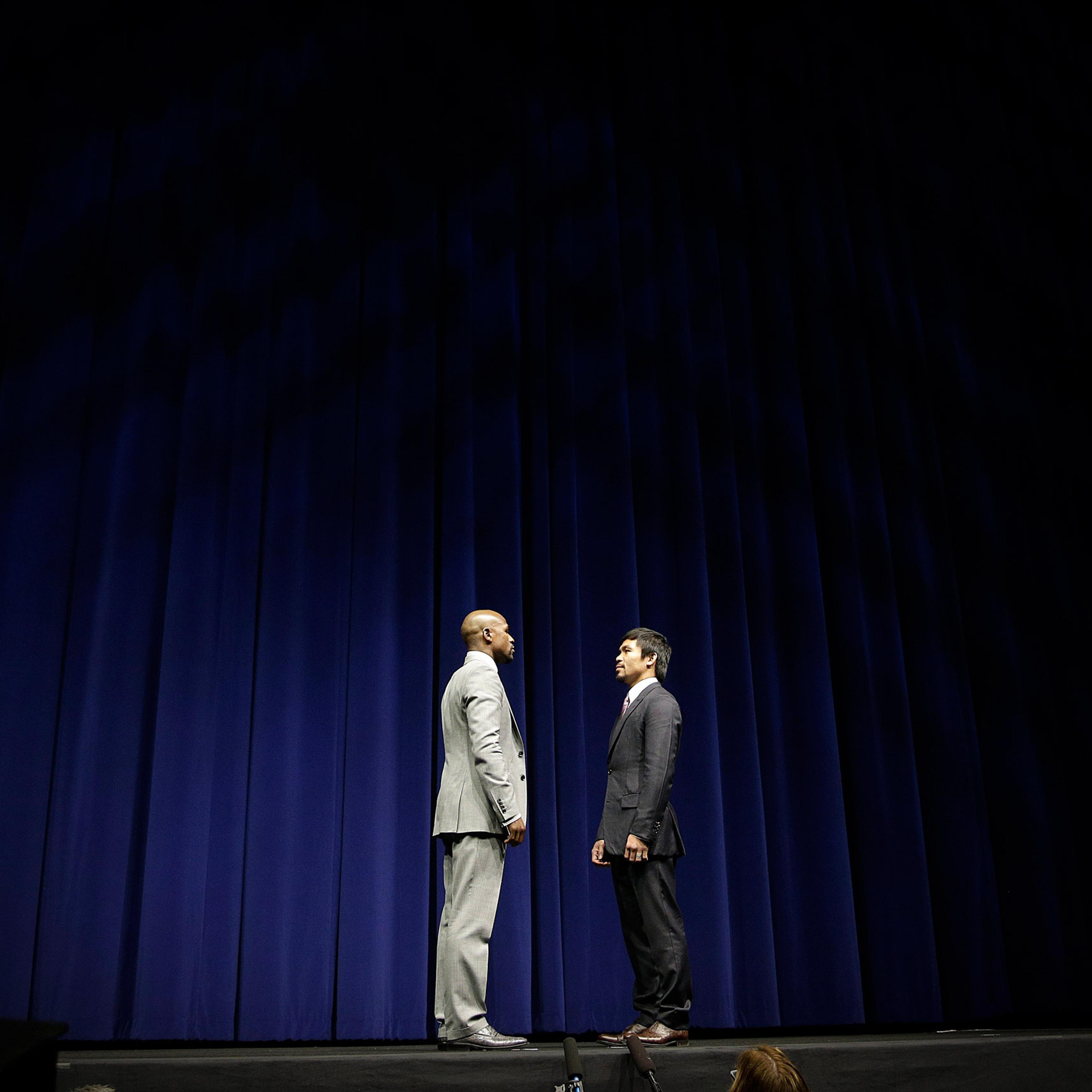 Boxers Floyd Mayweather Jr. and Manny Pacquiao pose during a news conference on March 11, 2015, in Los Angeles.