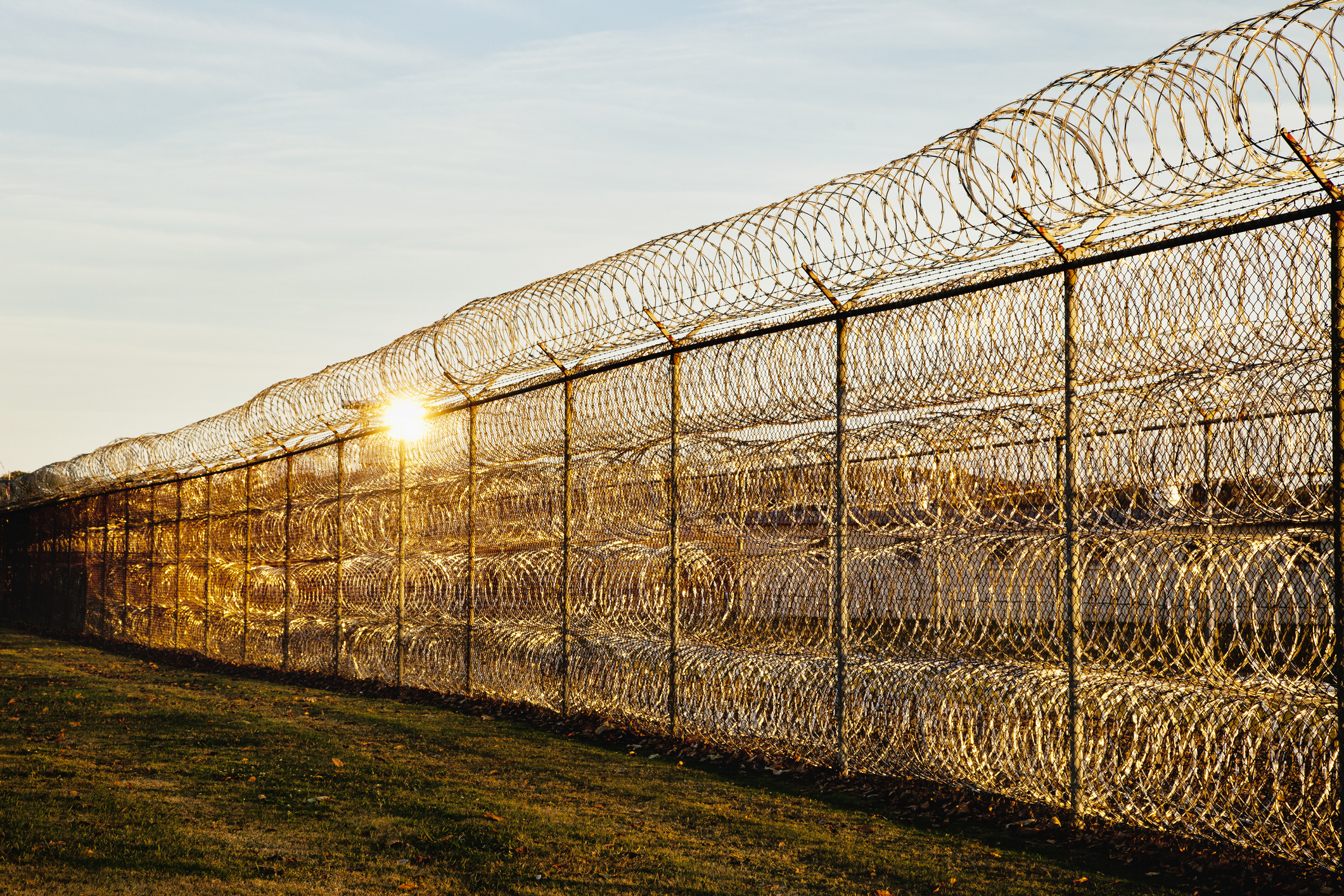 Razor wire surrounding a prison