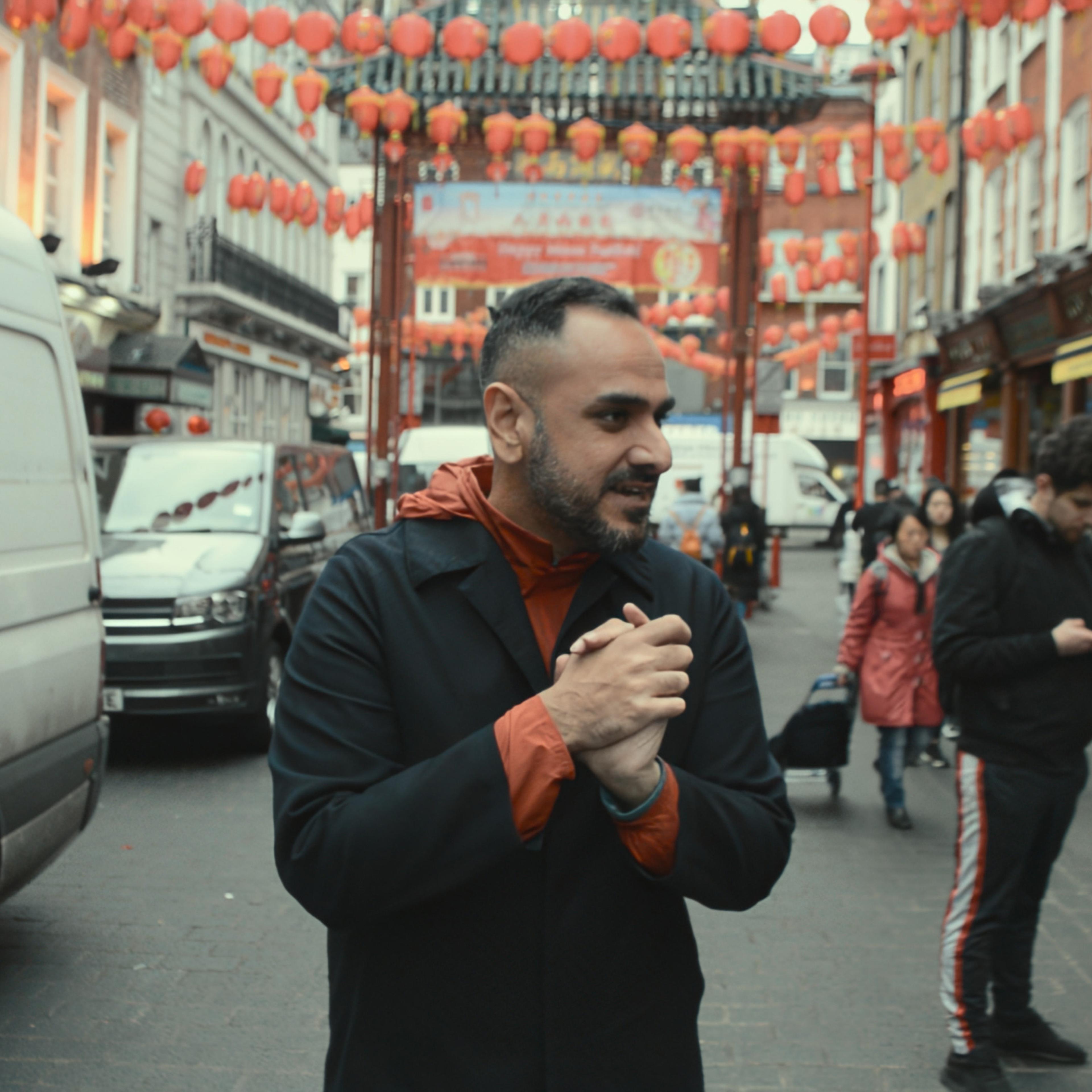 The so-called "Hollywood Con Queen" Hargobind Tahilramani in footage from his former food blog, as featured in the documentary by the same name on Apple TV+.