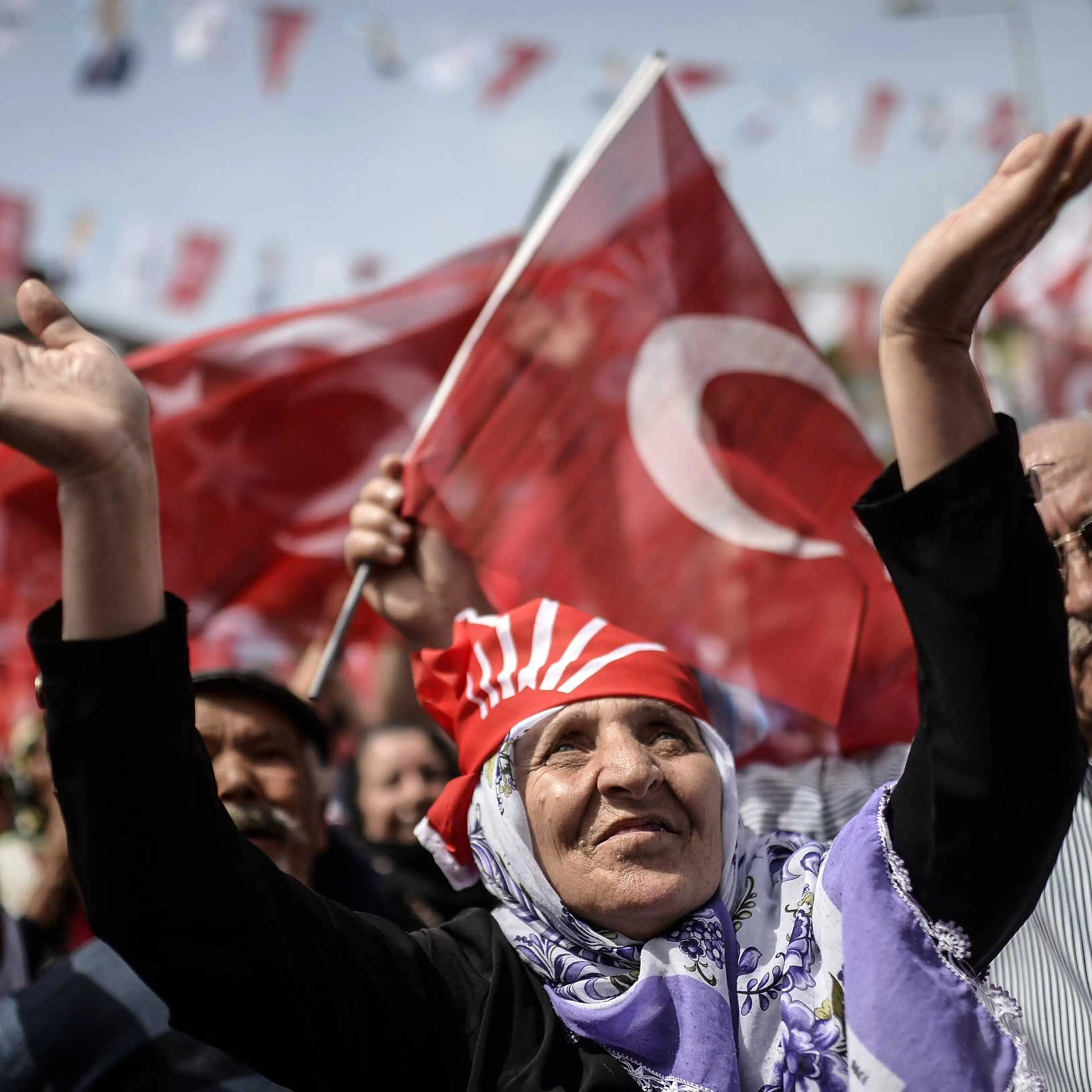 Supporters of Turkey's main opposition party, the Republican People’s Party (CHP) cheer their leader during an election rally ahead of the legislative election in Istanbul on May 24, 2015.